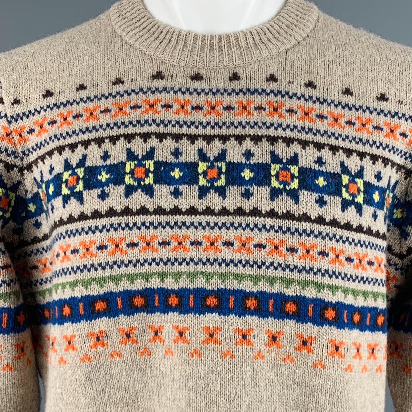 JOSEPH sweater
in a
grey wool knit featuring blue and orange Fair Isle pattern, blue contrast back, and
 crew neck.Excellent Pre-Owned Condition. 

Marked:   M 

Measurements: 
 
Shoulder: 18.5 inches Chest: 45 inches Sleeve: 27 inches Length: 27.5