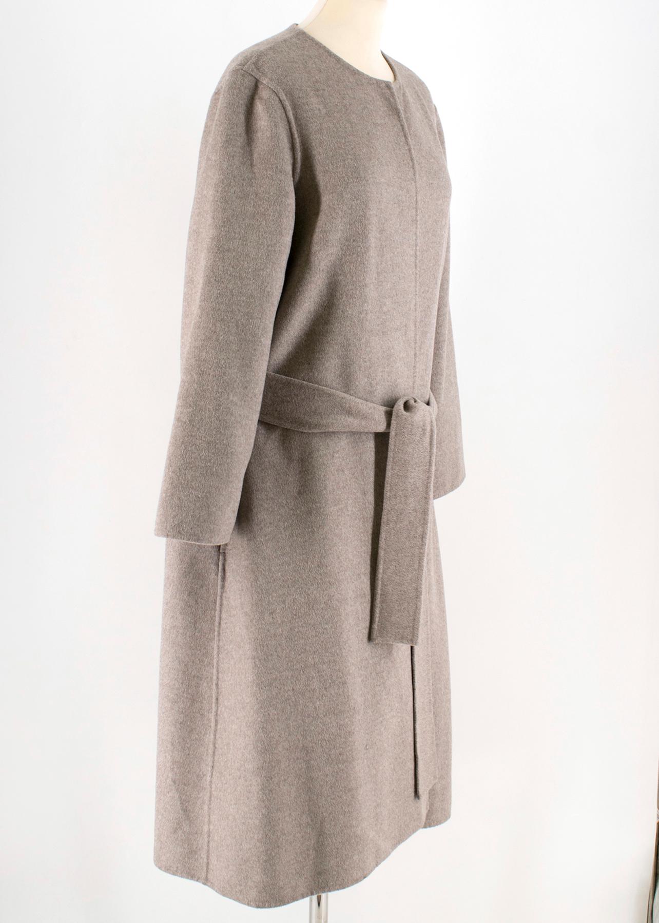 Joseph Taupe Wool blend Coat

- taupe wool blend coat 
- unlined
- belt fastened from the back inside
- round neckline

Please note, these items are pre-owned and may show some signs of storage, even when unworn and unused. This is reflected within