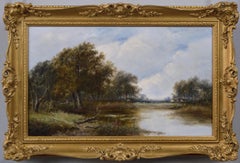 19th Century landscape oil painting of figures by a pond