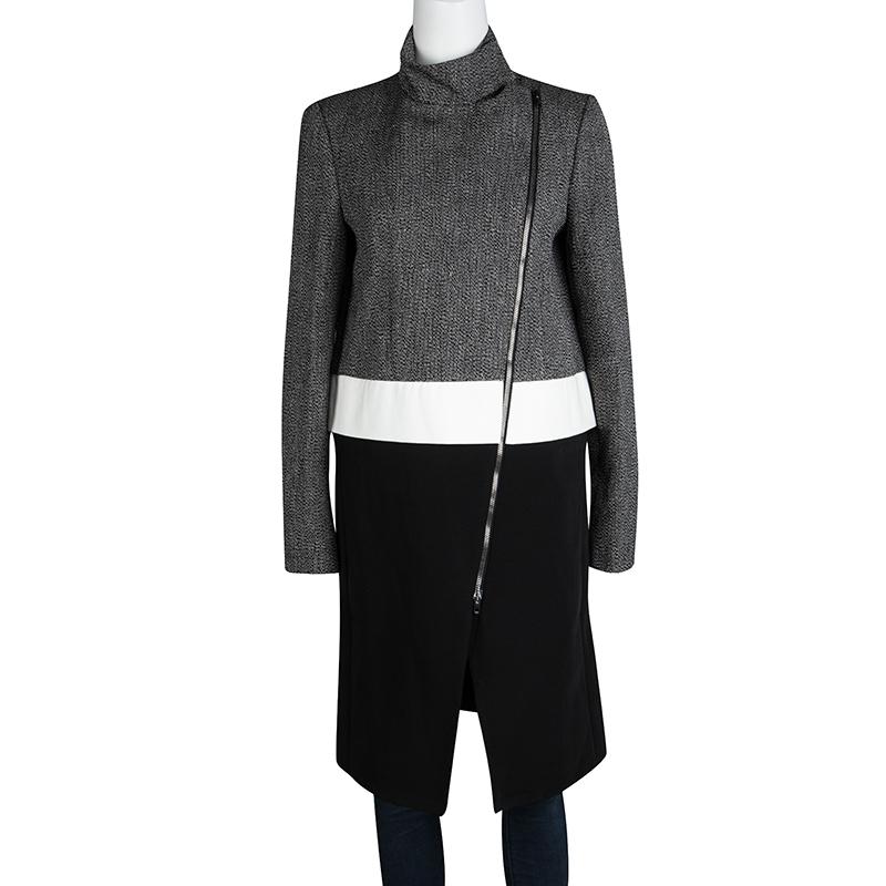 Be the trendiest person in the room whenever you choose to wear this tweed coat from Joseph! It comes tailored from the finest materials and designed with three different shades, long sleeves and a long slanting zipper at the front.

Includes: The