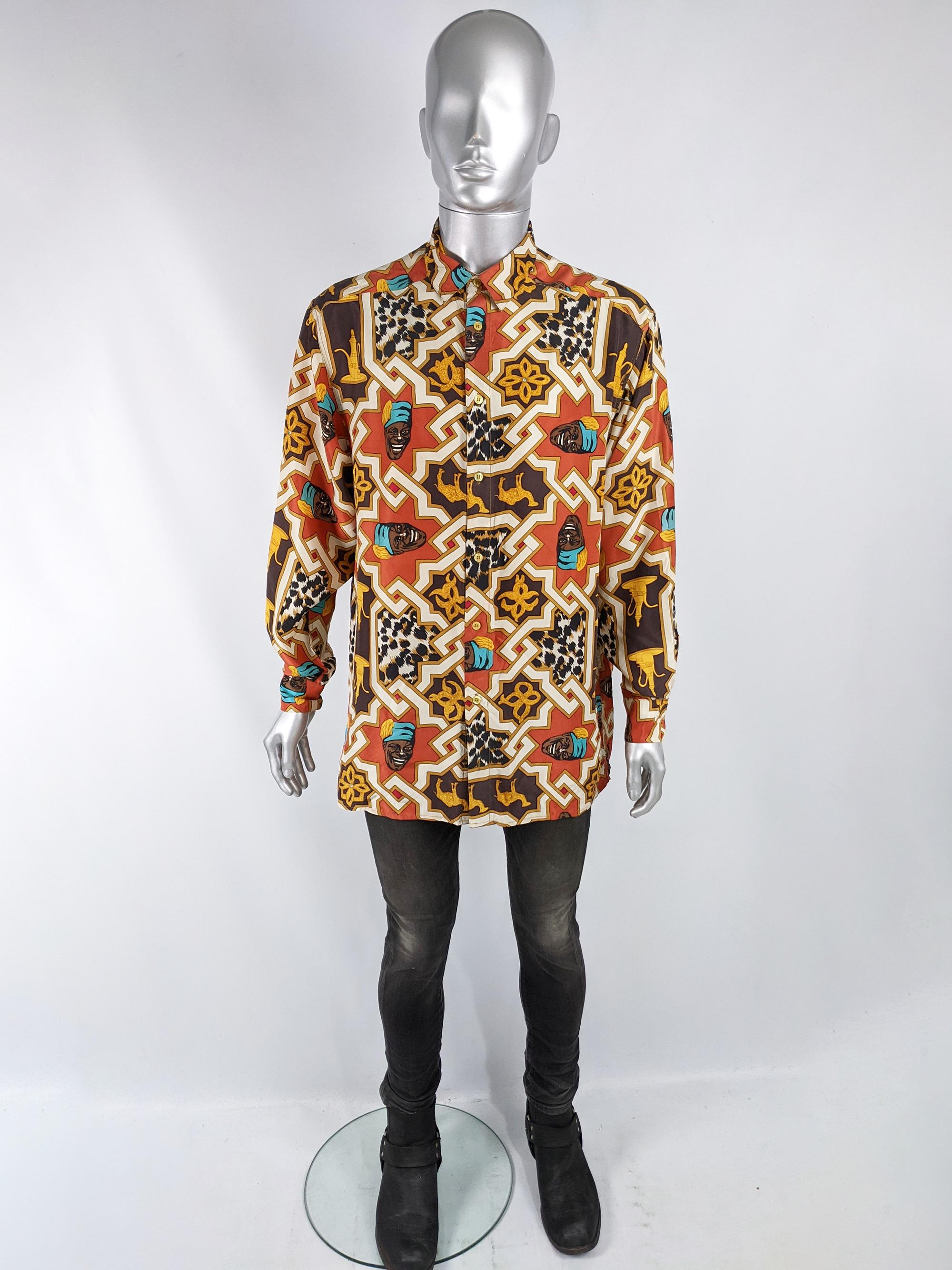 An incredible vintage mens shirt from the late 80s by luxury British fashion house, Joseph. In a bold all over patterned pure silk with a Moorish style and leopard print throughout. It has a loose, effortless fit. 

Size: Marked M but this gives a