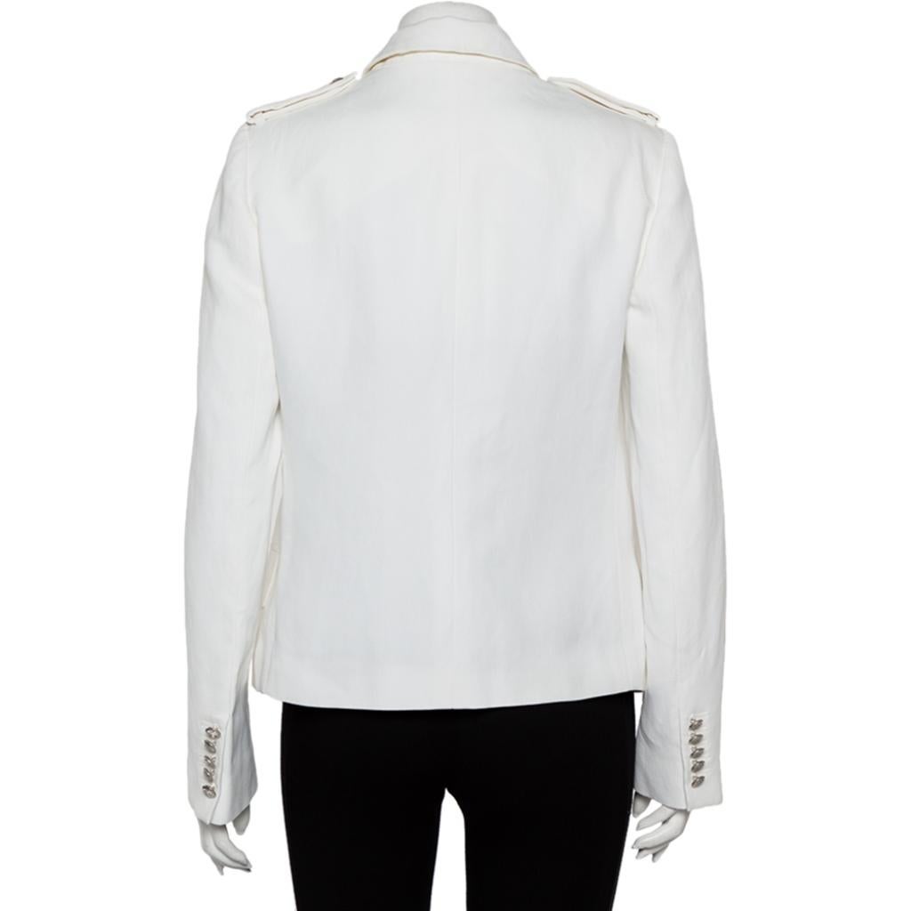 This Yvette blazer exudes elegance and is great for casual wear. Crafted from a white fabric blend, this blazer from Joseph is a must-have. It features a simple collar, button closure, pockets, long sleeves, and has been cut to offer a good
