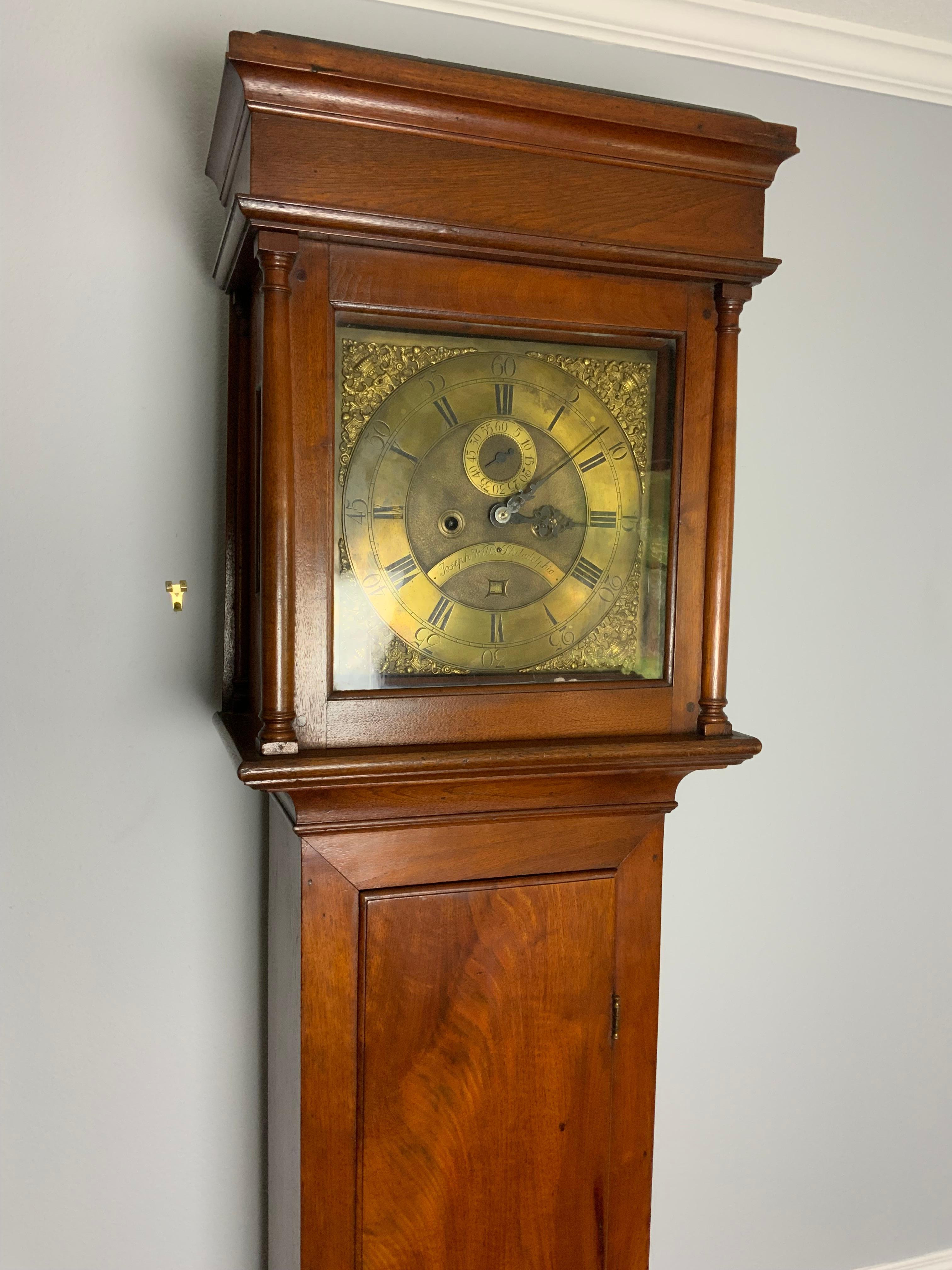  18th century 8 day Joseph Wills (1735-1755) Philadelphia tall case clock.  Flat top  case with a Brass dial with Roman numerals, second hand and date aperture.  The case is constructed of Walnut, yellow pine and poplar and has a very nice mellow