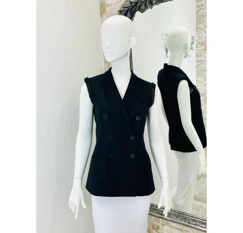 Joseph Wool Double Breasted Waistcoat

Black with collar, frayed edging to arm area.

Additional information:
Size – 38FR
Composition- Wool, Cotton Lining
Condition – Very Good
