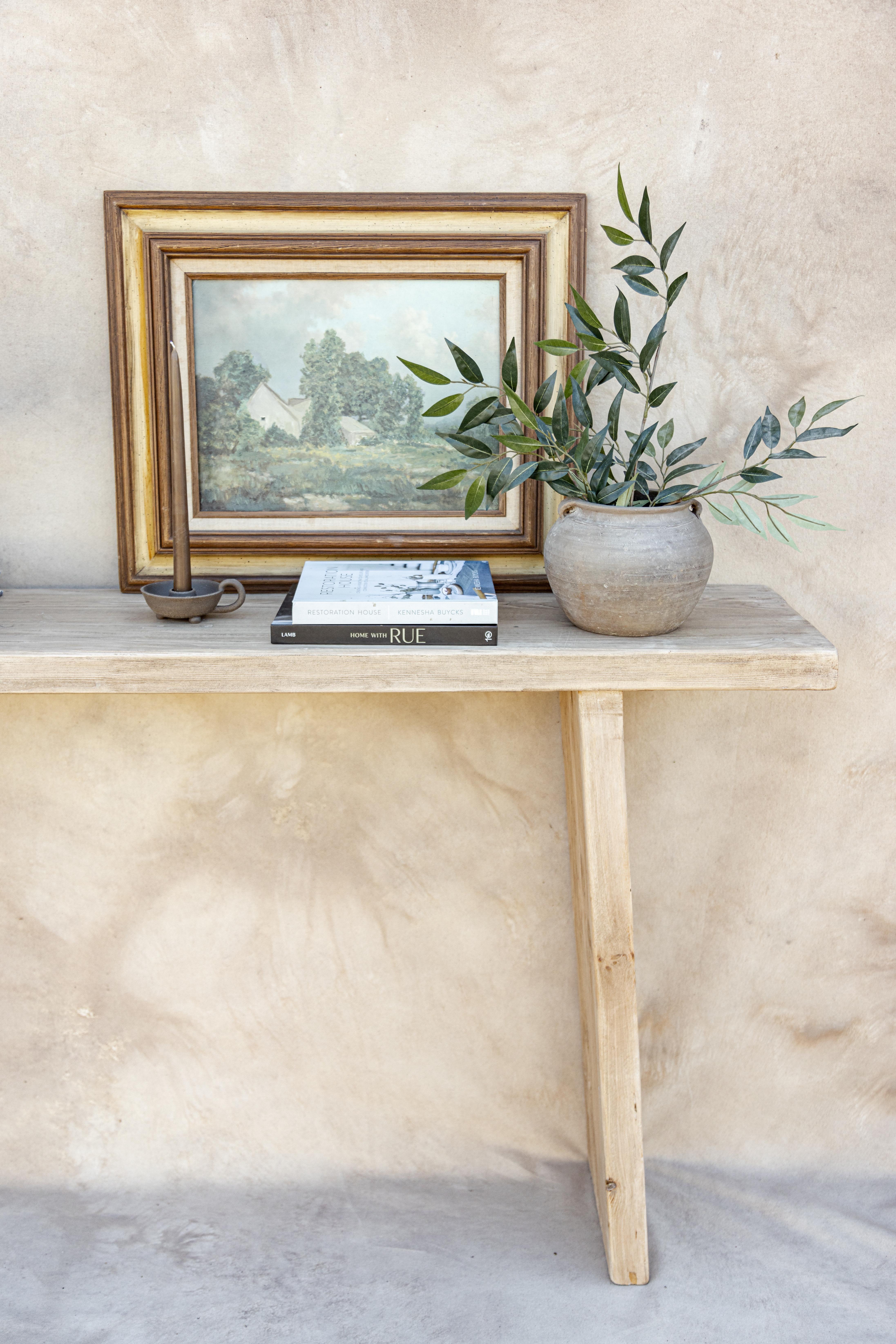 Introducing our Josephine console table. Crafted from elm wood sourced throughout Europe and Asia. We love her minimalist, rustic design and texture. Style in an entryway or along a hallway.