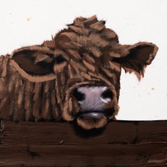 Brown Cow on Fence