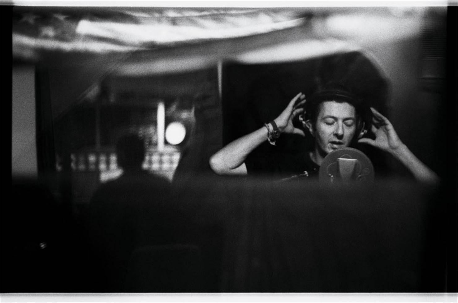 Josh Cheuse Black and White Photograph - Joe Strummer in Studio