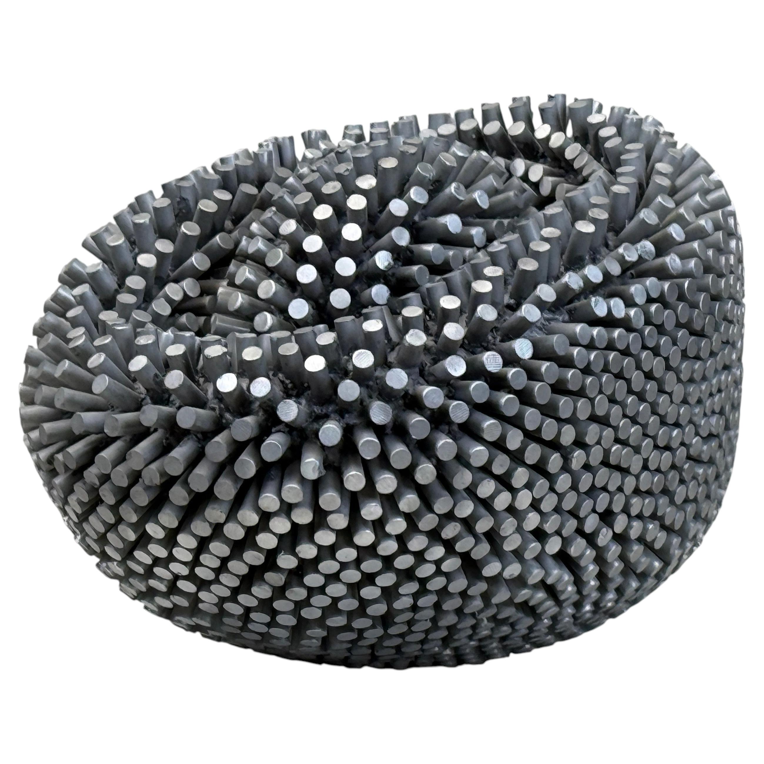 Scultura in alluminio “Emerge” di Josh Garber