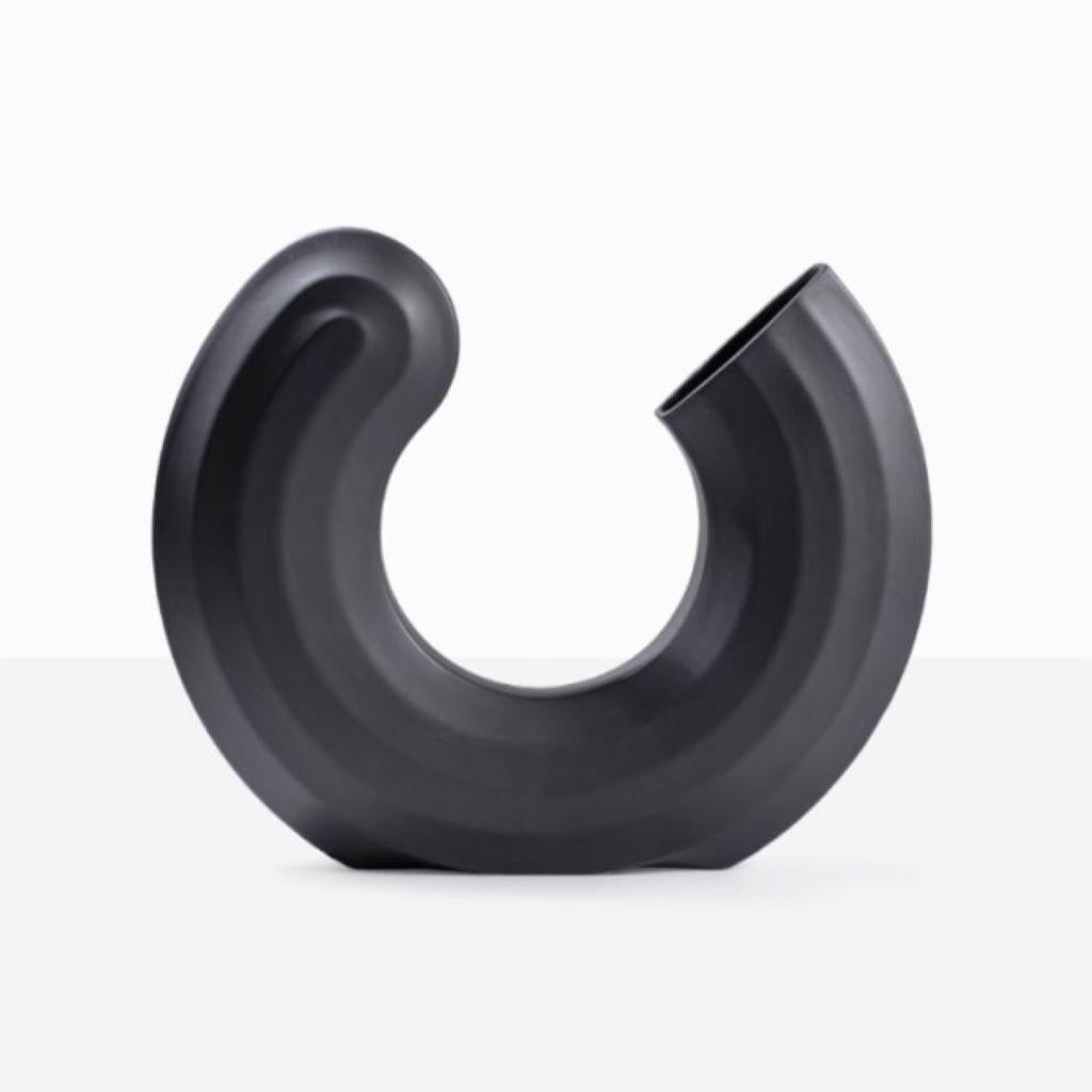 We All Make the Flowers Grow -black

By Josh Sperling

Josh Sperling is an American contemporary artist recognized for his colorful, sculptural wall works that blur the line between painting and sculpture. Using precisely cut plywood forms covered
