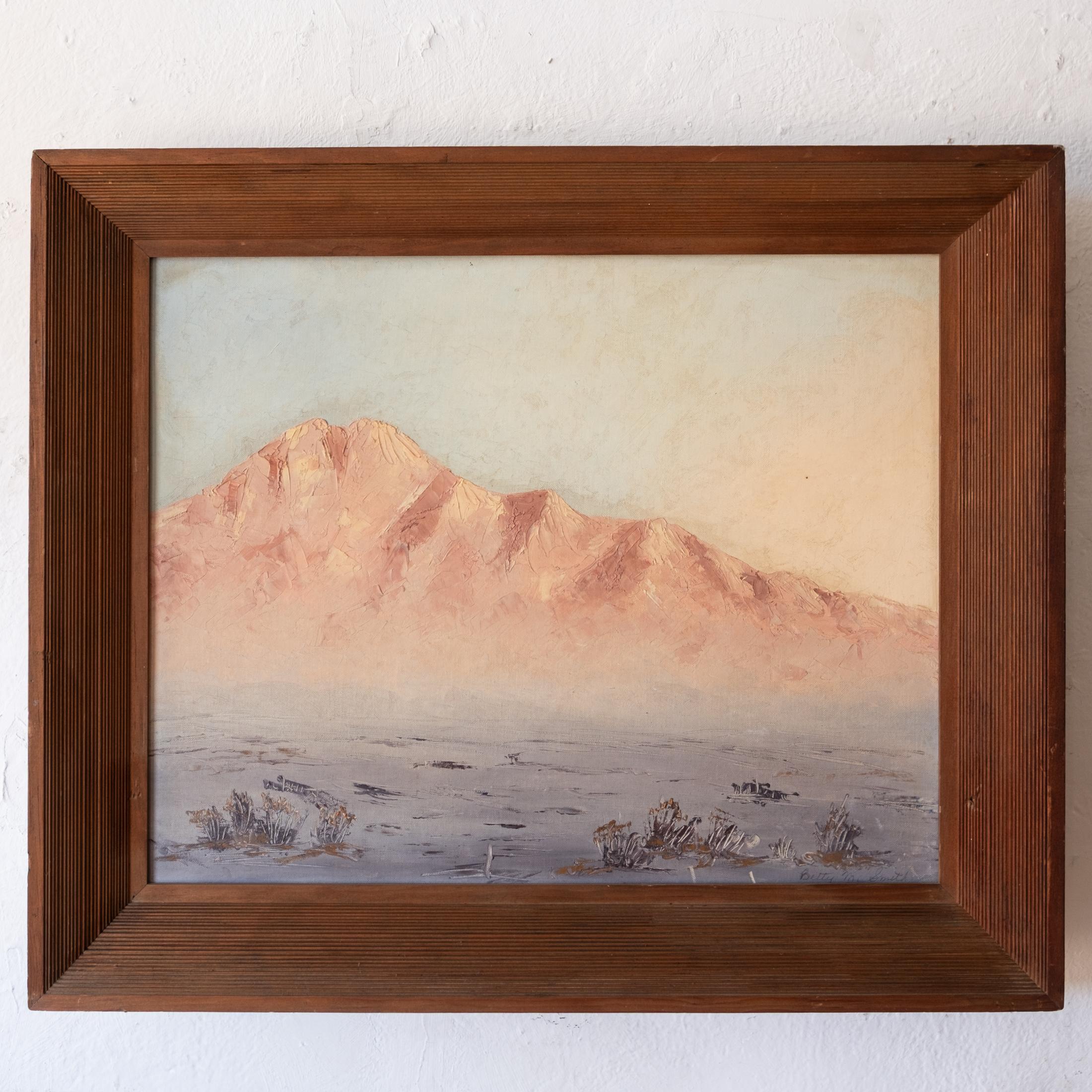 Joshua Tree National Park desert landscape painting that captures the beauty and grandeur of this iconic park. Nice texture on board with the original wood frame. Signed by Betty Marie Smith and entitled Pink Mountains. USA, 1960s