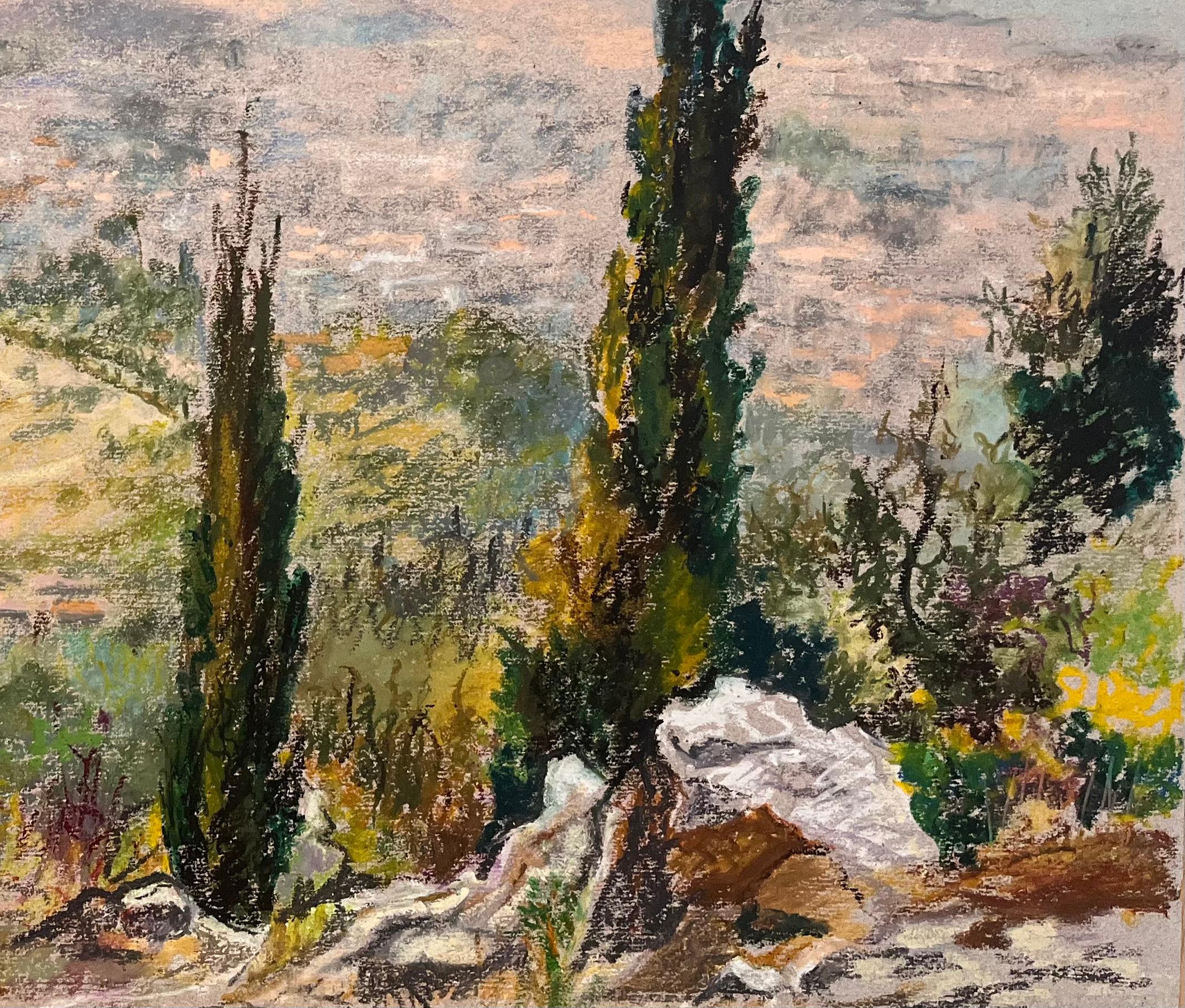 Title: Mid Century French Original Pastel Drawing of Hillside View with Cypress Trees

Artist: Josine Vignon (French 1922-2022)

Medium: Oil Pastel on artist paper

Size: 19.75 (height) x 25.75 (width)

Stamped: Verso

Condition: Good

Provenance: