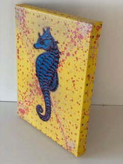 Blauer Seepferdchen auf Gold