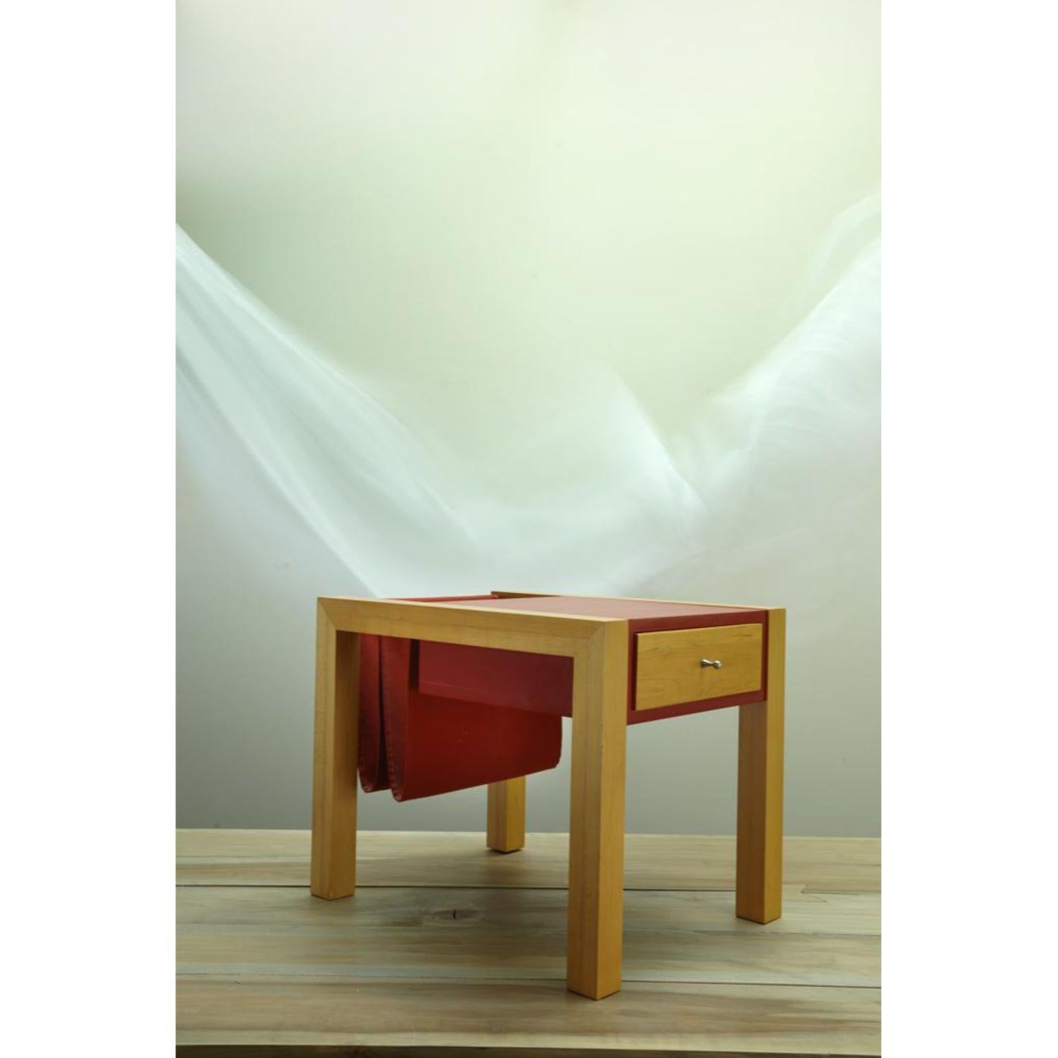 Joué side table by Jean-Baptiste Van den Heede
Signed and numbered
Dimensions: L 52 x W 41 x H 42 cm
Materials: Solid maple, red lacquer, fabric

Joué side table. Versatile furniture with drawer and magazine rack, for auxiliary table, bedside