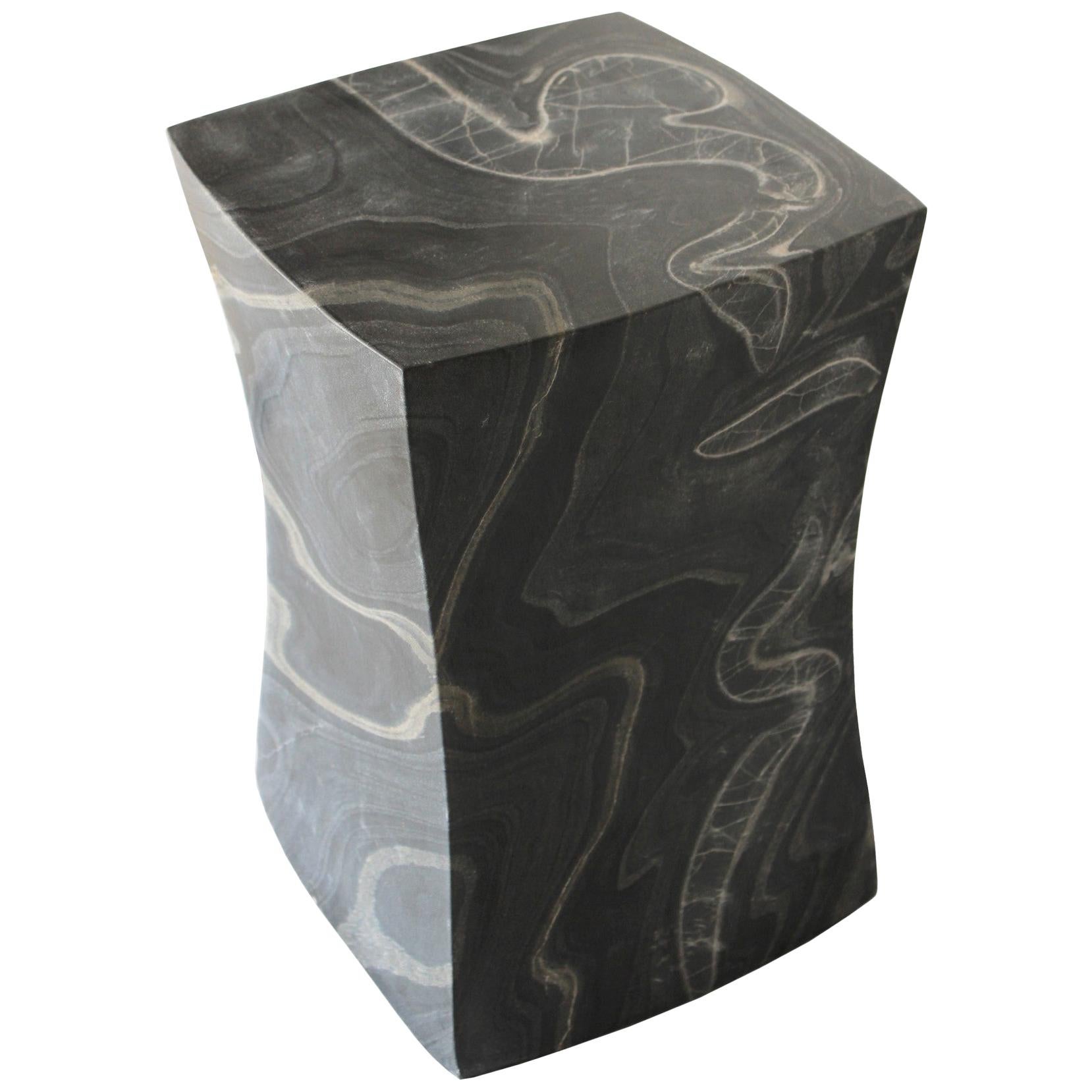 While inspecting the works in one of her workshop's, Stephanie Odegard encountered these beautiful blocks of black marble with exceptional grains in them and reserved them to not be carved as the Jali tables and instead to be made as the block