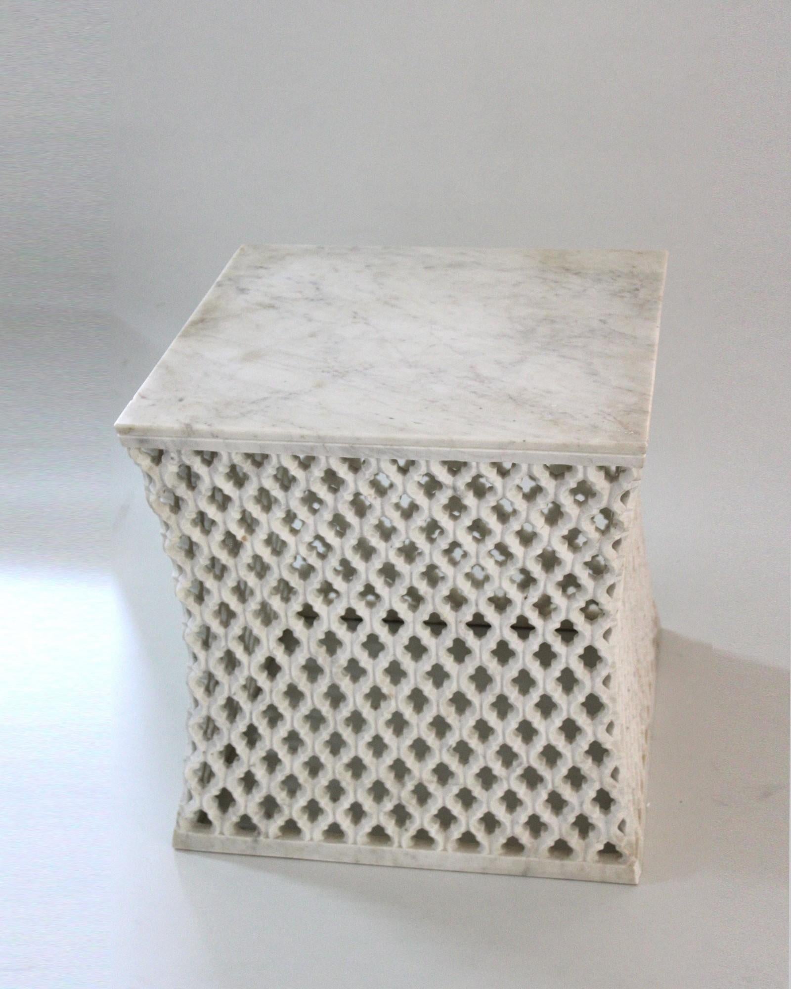 Inspired by the elegant pierced marble “jali” screens and windows he saw in the palaces of Mughal India, the renowned designer Paul Mathieu has created a unique collection of hand-carved side tables. Manufacture: Solid blocks of marble are hollowed