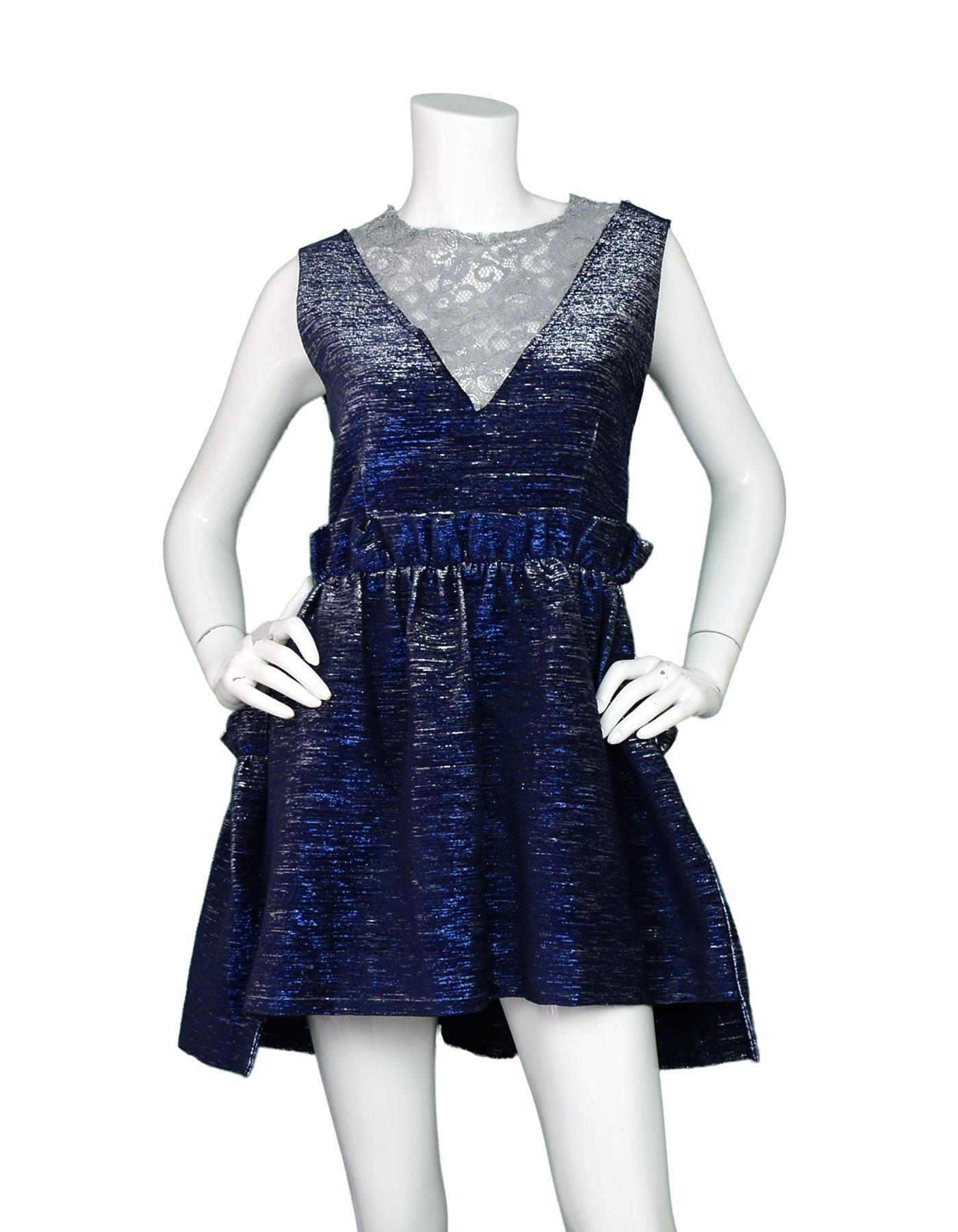 Jourden Blue Metallic Ruffle Dress W/ Silver Lace NWT Sz 42

Made In: China
Color: Blue and silver
Materials: Fabric 1: 65% acrylic, 30% polyester, 5% polymetal. Fabric 2: 90% Viscose, 10% Polyamide 
Opening/Closure: Hidden zipper in back
Overall