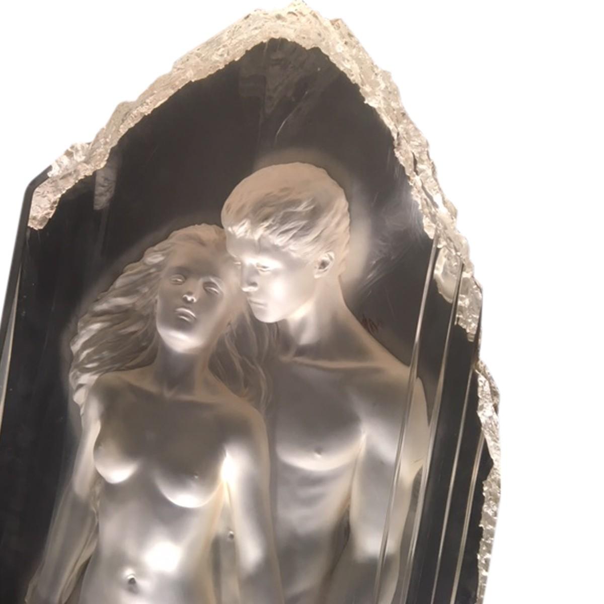 Edition of 75.
Sensual sculpture of a nude woman and man.
Cast clear acrylic allows for play of light on varied surfaces.
Includes black plastic rectangular display pedestal.
Previously property of a Beverly Hills estate.
Michael Wilkinson