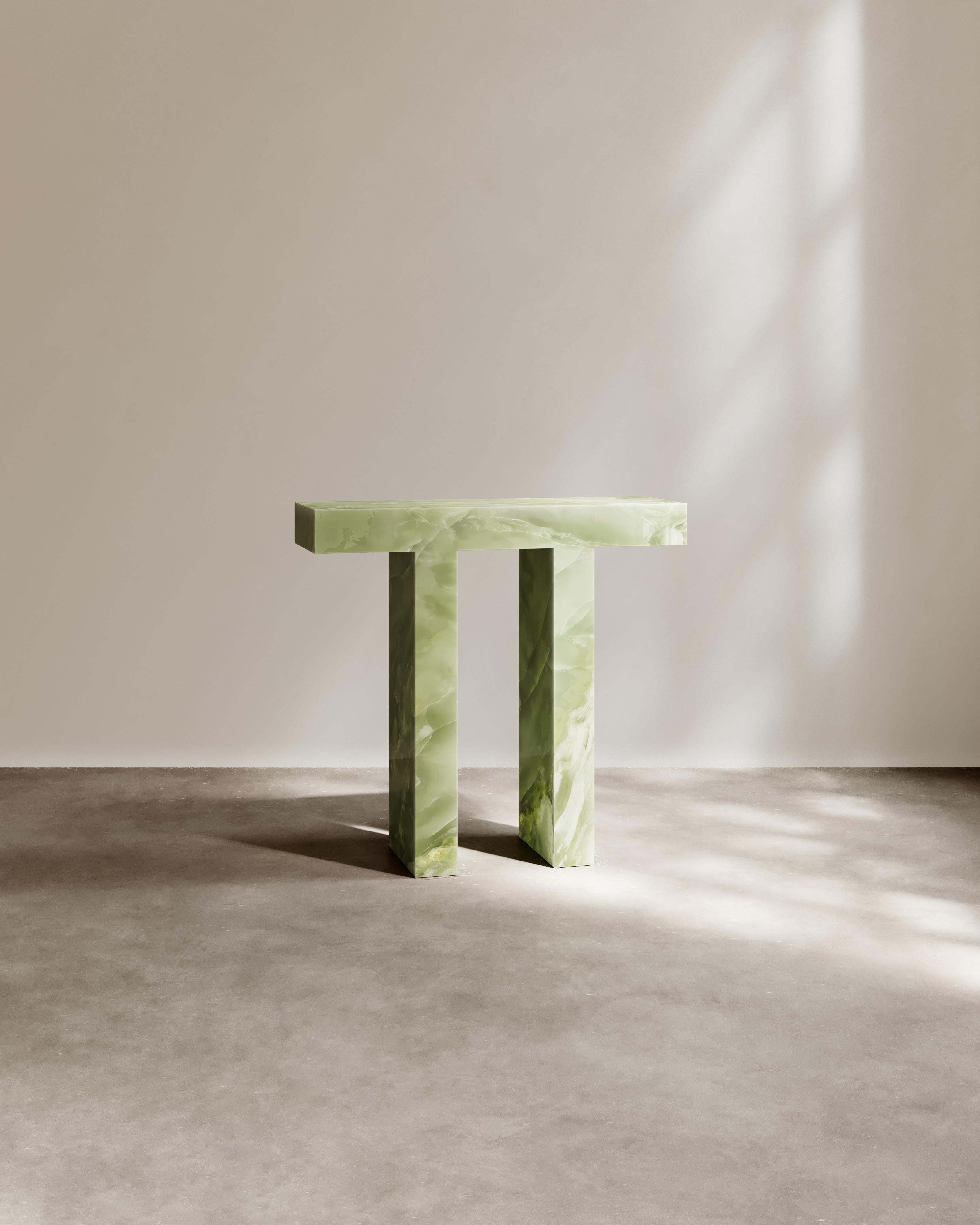 Journeyman Console Table in Natural Verde Onyx by Paloma Editions
Dimensions: D 30 x W 90 x H 85 cm.
Materials: Natural Verde onyx.

The Journeyman Console is hand-carved from a single block of stone. The Travertine features a honed finish, while
