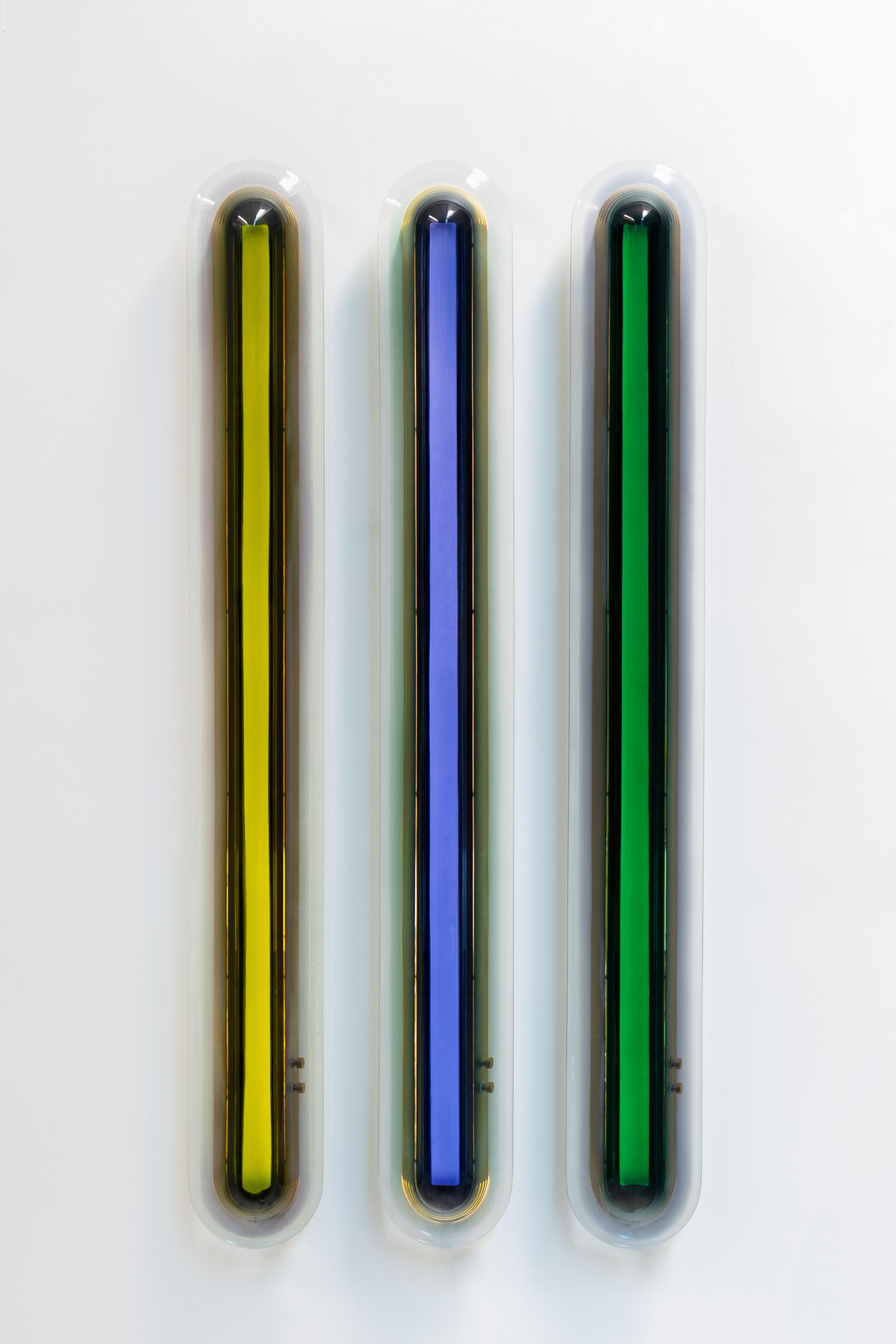 Taking cues from the 1970s and the Space Age era, these unique luminous 'capsules' draw on rich, multi-layered epoxy resin and dimmable neon lighting to produce deep and lustrous hues. By skilfully layering harmonizing tones, they emit a gentle,