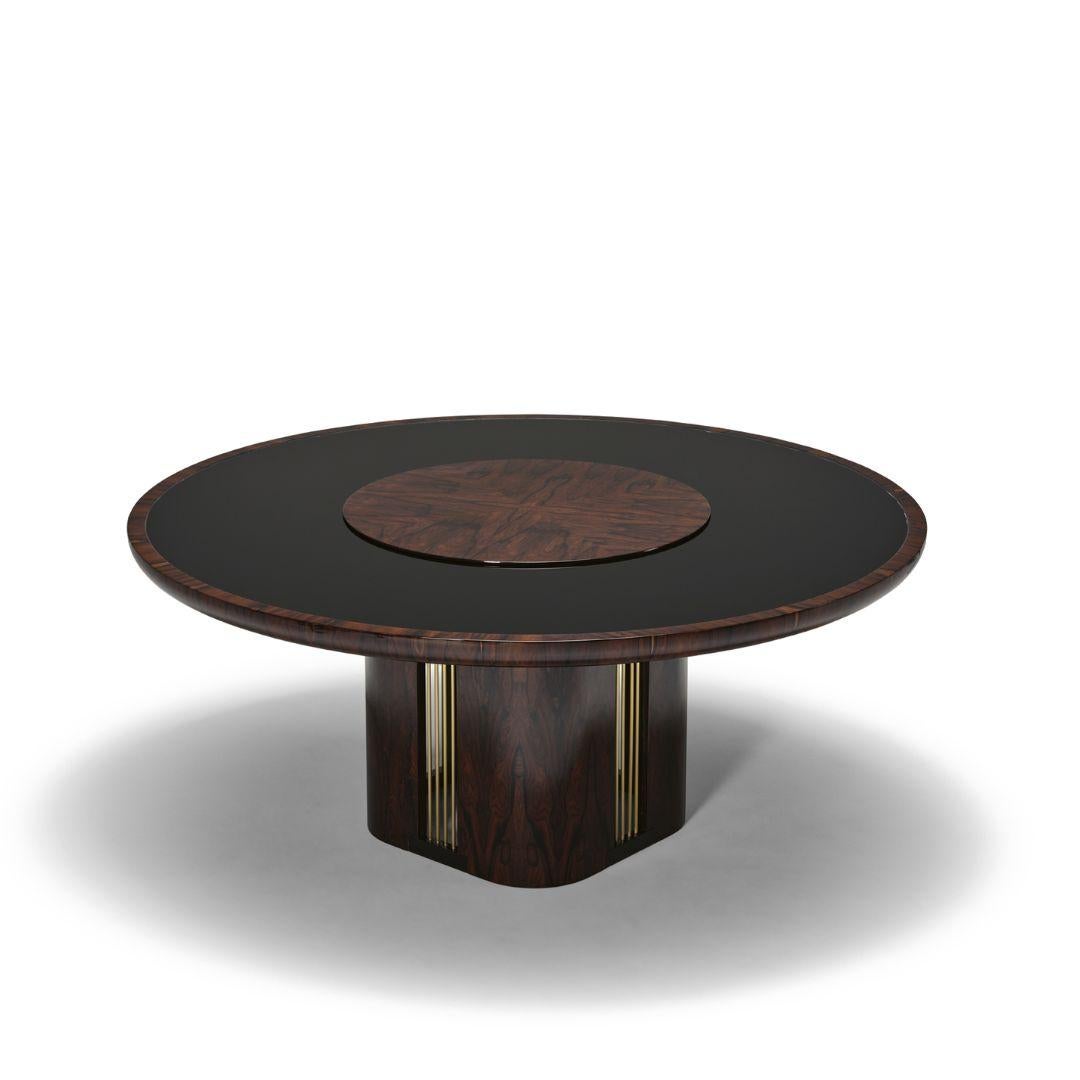 JOYA dining table truly reflects refined contemporary elegance and is outstanding in its use of luxury materials and attention to detail.
This sophisticated design features a sensational round mirrored top, partnered with a rotating centerpiece in