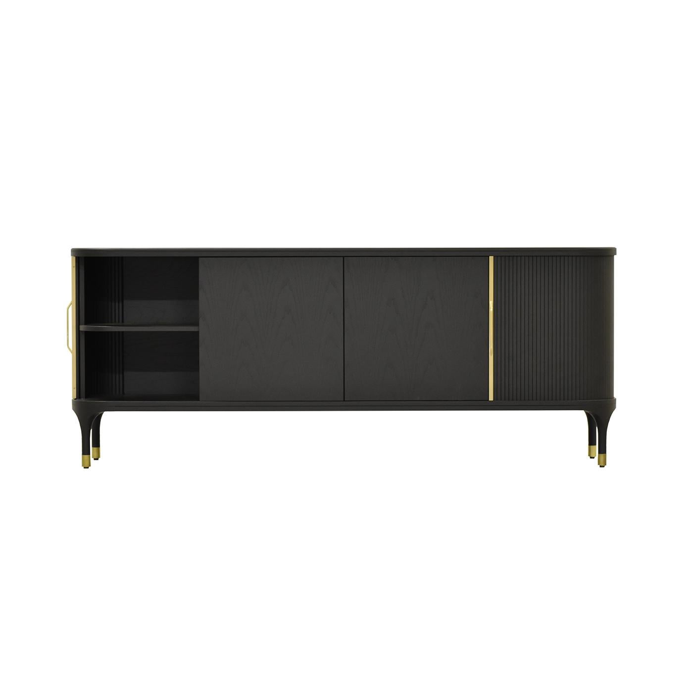 Standing on four tapered feet embellished with brass details, this sideboard is a sophisticated piece suitable for a wide variety of decors. The solid ash structure showcases an elegant black finish, which fits with the grooved texture of the two