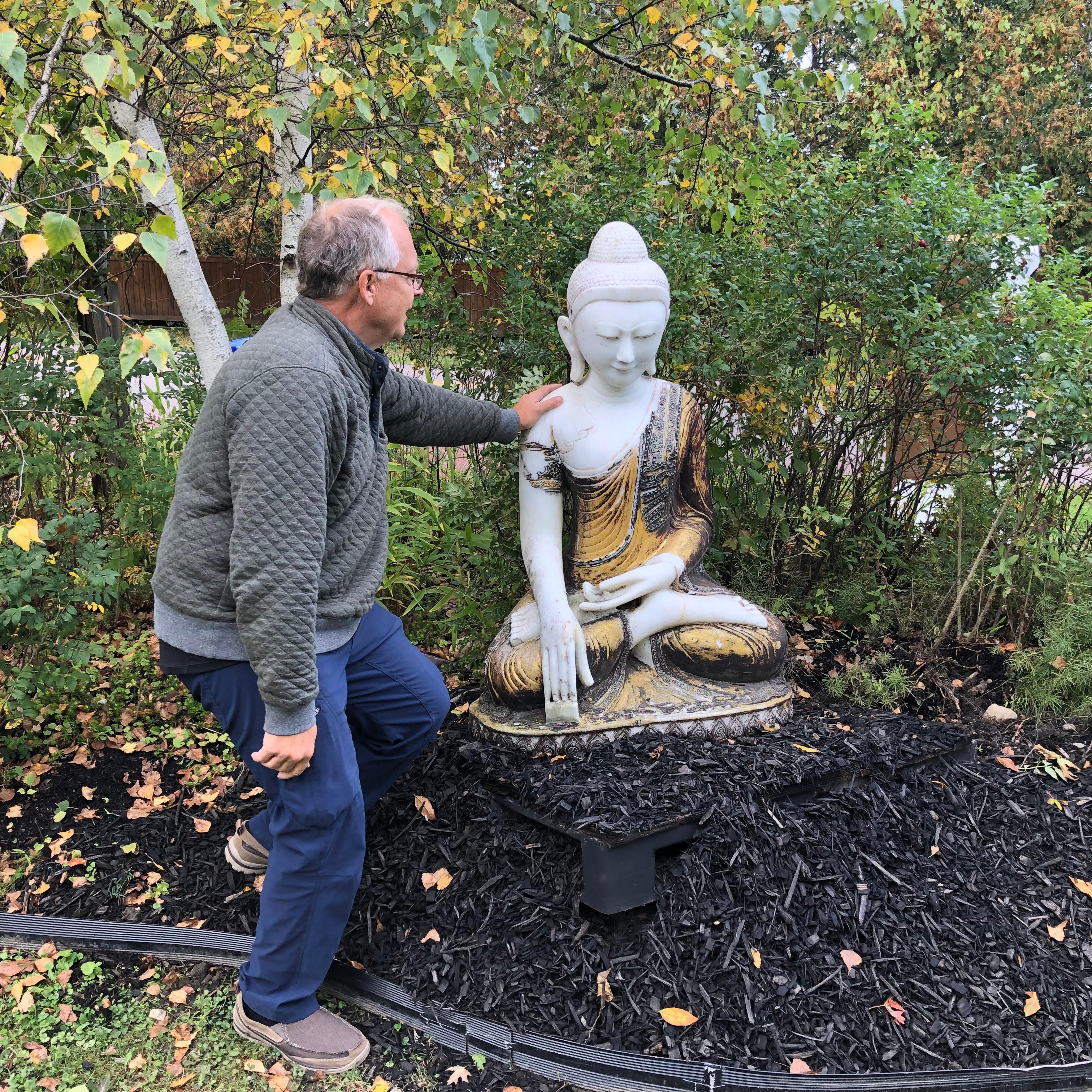 For a Special Garden, 50 Inches Tall

Burma (Myanmar), Mandalay, a monumental hand carved and gold hand lacquered stone seated Buddha with a joyful face dating to the early 20th century.

This beautiful Buddha sculpture will bring serenity and