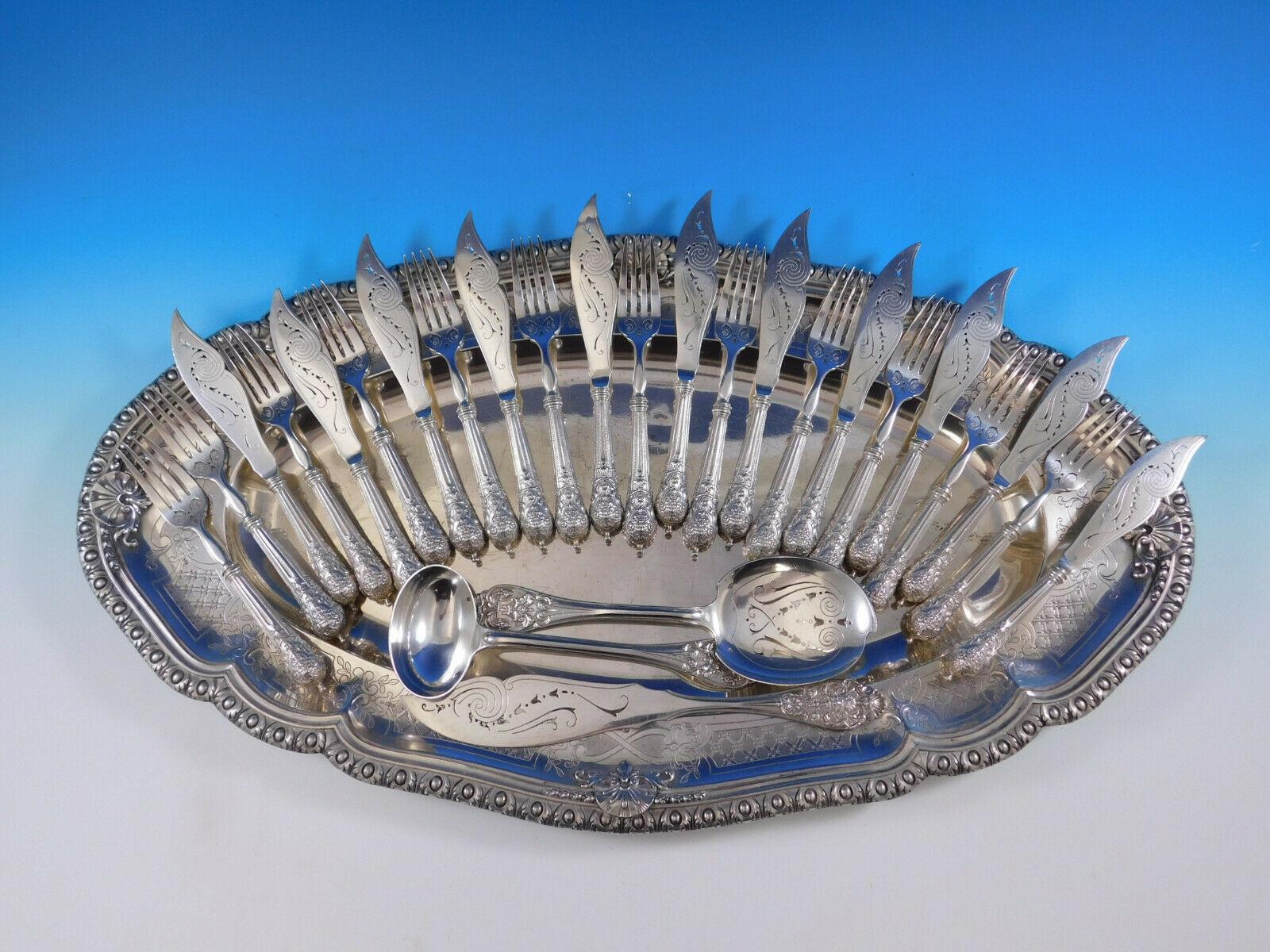 Beautifully pierced French sterling silver fish set with figural Renaissance design, 26 piece cutlery set plus fish serving platter (dated 1925). This set includes:

11 individual fish knives, hollow handle, with pierced sterling blades, 8