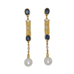 J.P De Saedeleer 18 Kt gold Earrings with 5.84 Ct Sapphires, Diamonds, Pearl