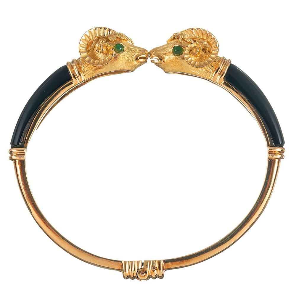 The rams’ opposing heads come together and touch noses, kissing as the bracelet rests on your wrist. The textured detail results in a lifelike rendering of these beautiful creatures, their allure augmented by the diamonds on their horns and the