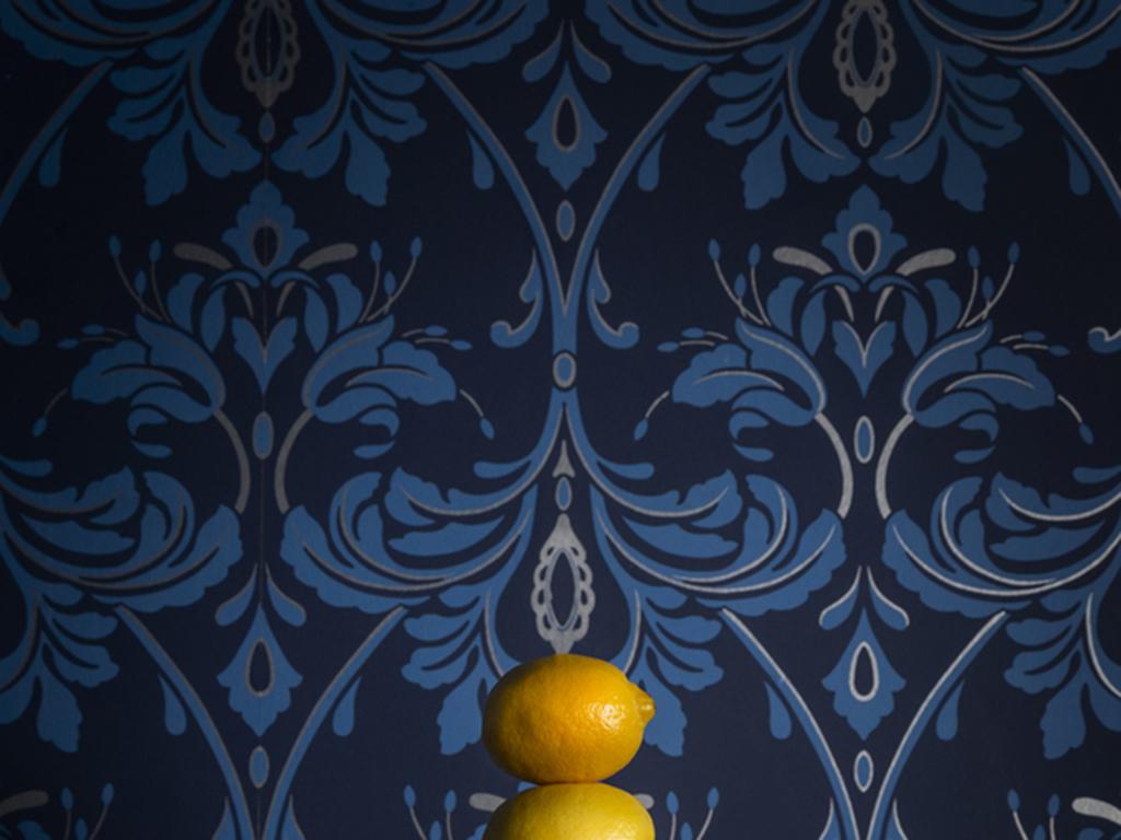 The Tower of Lemon - Still life stacked lemons, yellow dish blue floral vintage - Photograph by JP Terlizzi