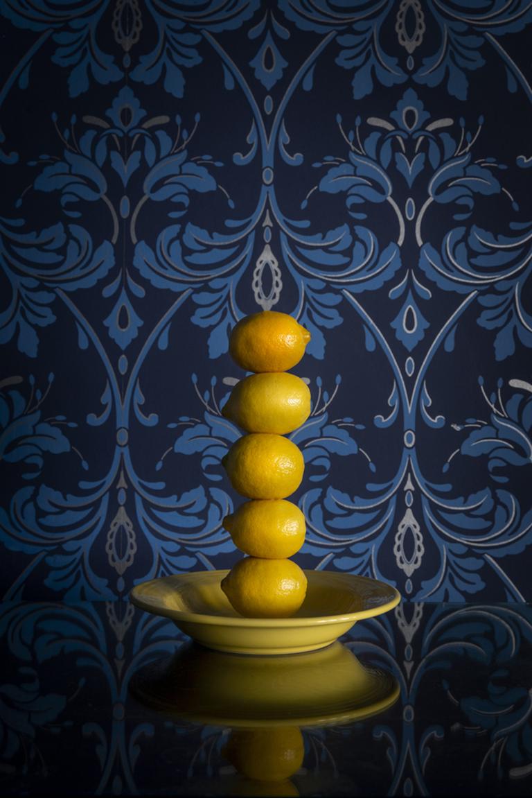 JP Terlizzi Color Photograph - The Tower of Lemon - Still life stacked lemons, yellow dish blue floral vintage