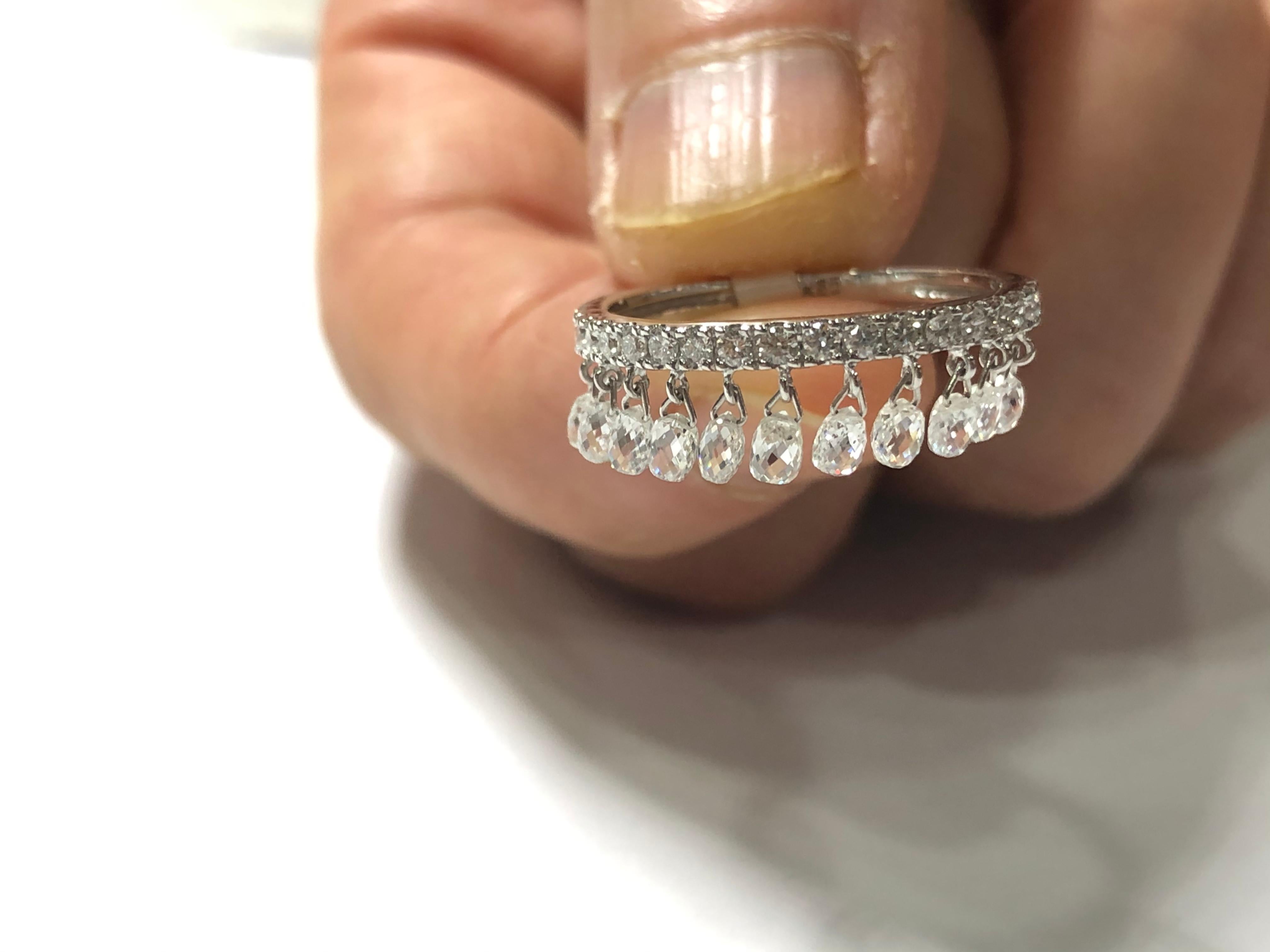 JR 1.31 Carat Diamond Briolette Dangling Ring 18 Karat White Gold

 Inspired by the beauty of a rain drop, Our eccentric Dangling diamond ring is an absolute show-stopper. it has 11 pieces Rain Dropp White Diamond Briolettes.

Ring Size Europe 53