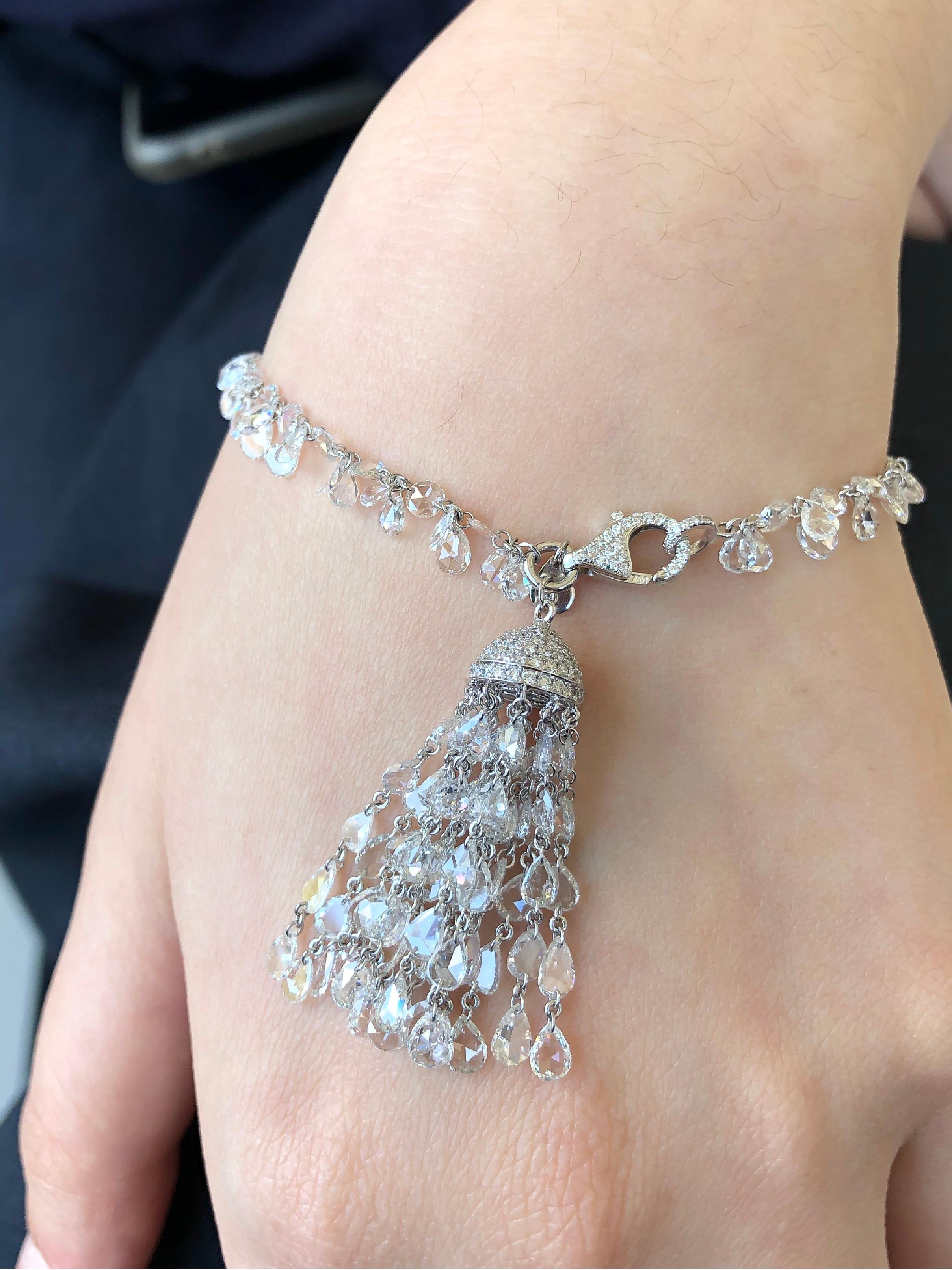 JR 18 karat White Gold 14.56 carats Rose Cut Diamond Tassel Bracelet 

Explore our superlative contemporary bracelet that will not only complement but enhance every mood and outfit of yours! , It has 14.56 carats White Diamond , Beautifully made