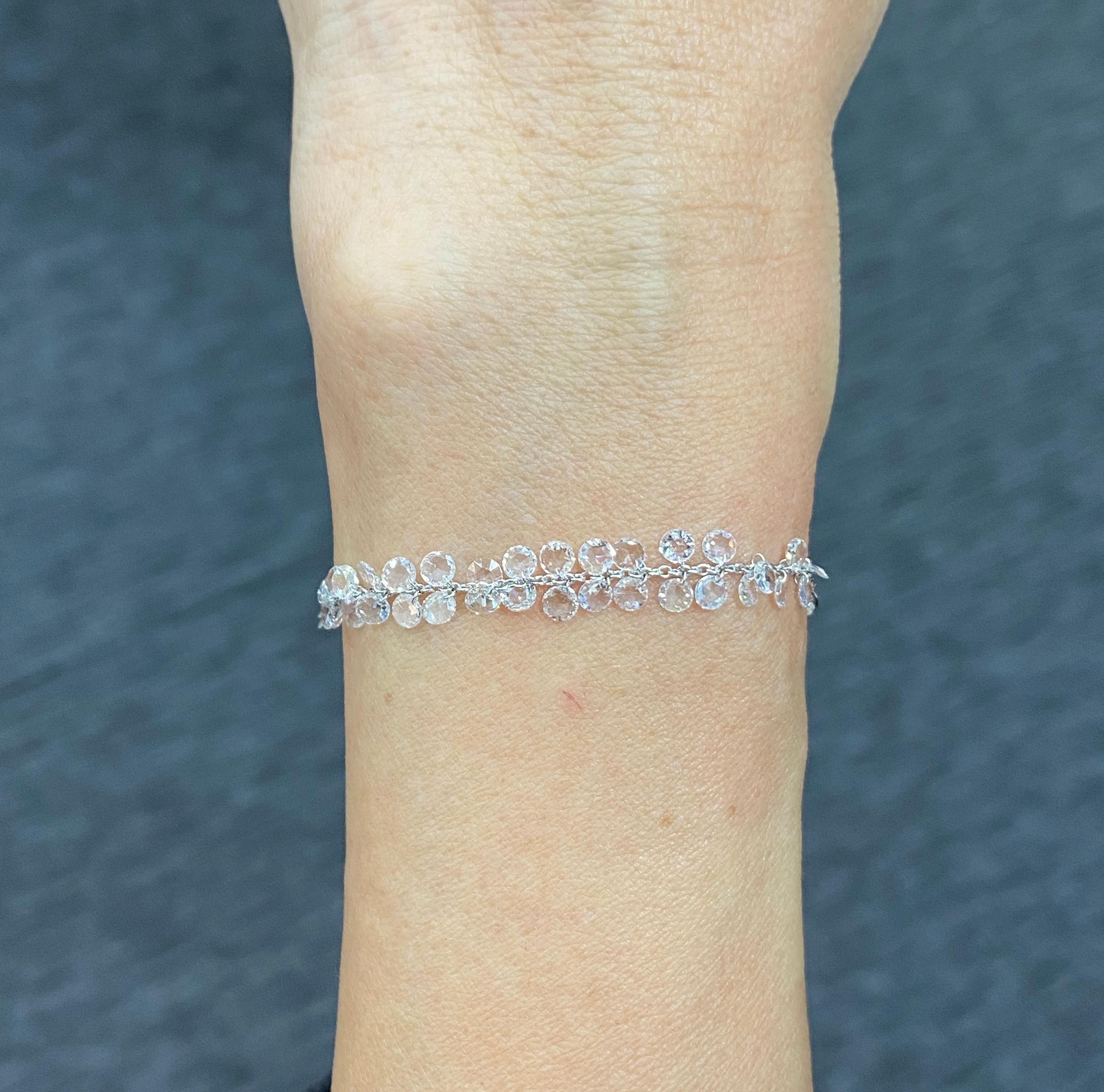 JR 2.00 Carat Dangling Rose Cut Diamond 18 Karat White Gold Bracelet

Our dangling rose-cut diamond bracelet is extremely wearable. Its versatility and classic design make it a great accompaniment to various occasions. Beautifully made with Drilled