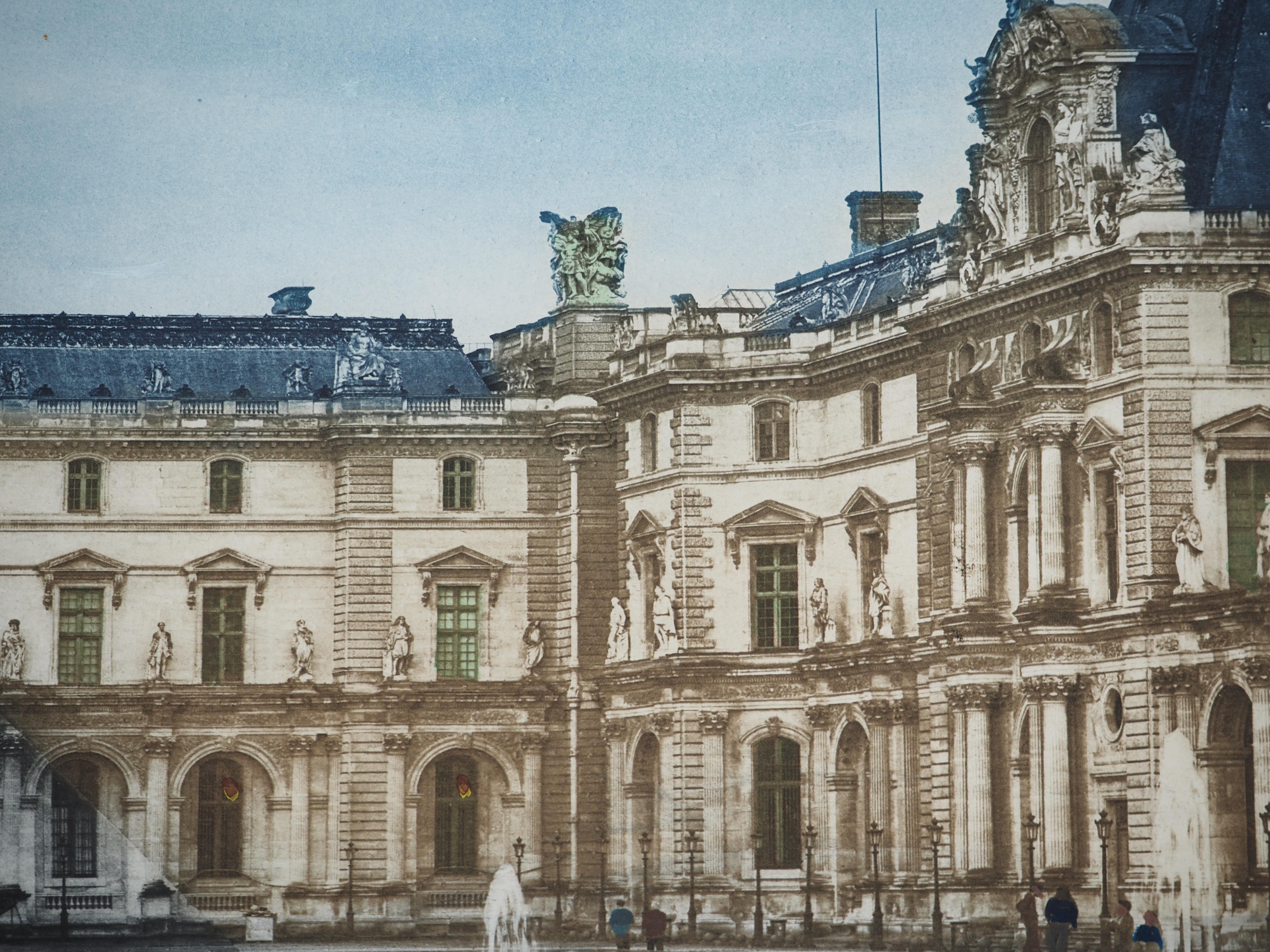 JR (aka Jean René)
The Louvre Pyramid

Heliogravure 
Not signed
On  Somerset vellum 58.5 x 90 cm (c. 23.04 x 35.44 inch)

INFORMATION : Published by the Chalcographie du Louvre and authenticated by the studio's dry stamp. 

Excellent condition