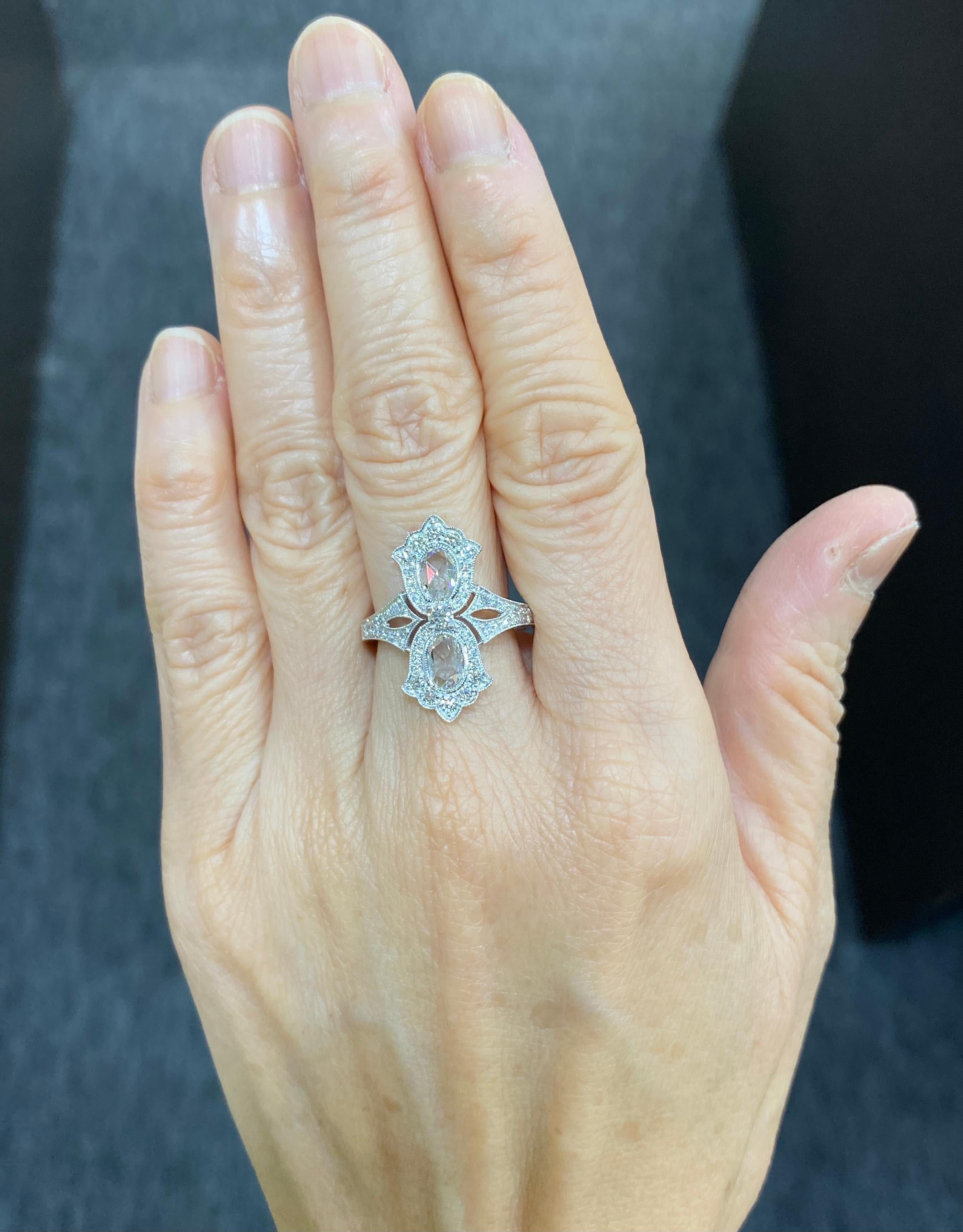 JR Double Rose Cut Diamond 18 Karat White Gold Ring

Estate diamond ring with two large rose cut diamond set in 18k white gold

Ring Size Europe 54 (US 6.75) ,
Ring Size can be resize upon request.

Addition details or Video upon request.