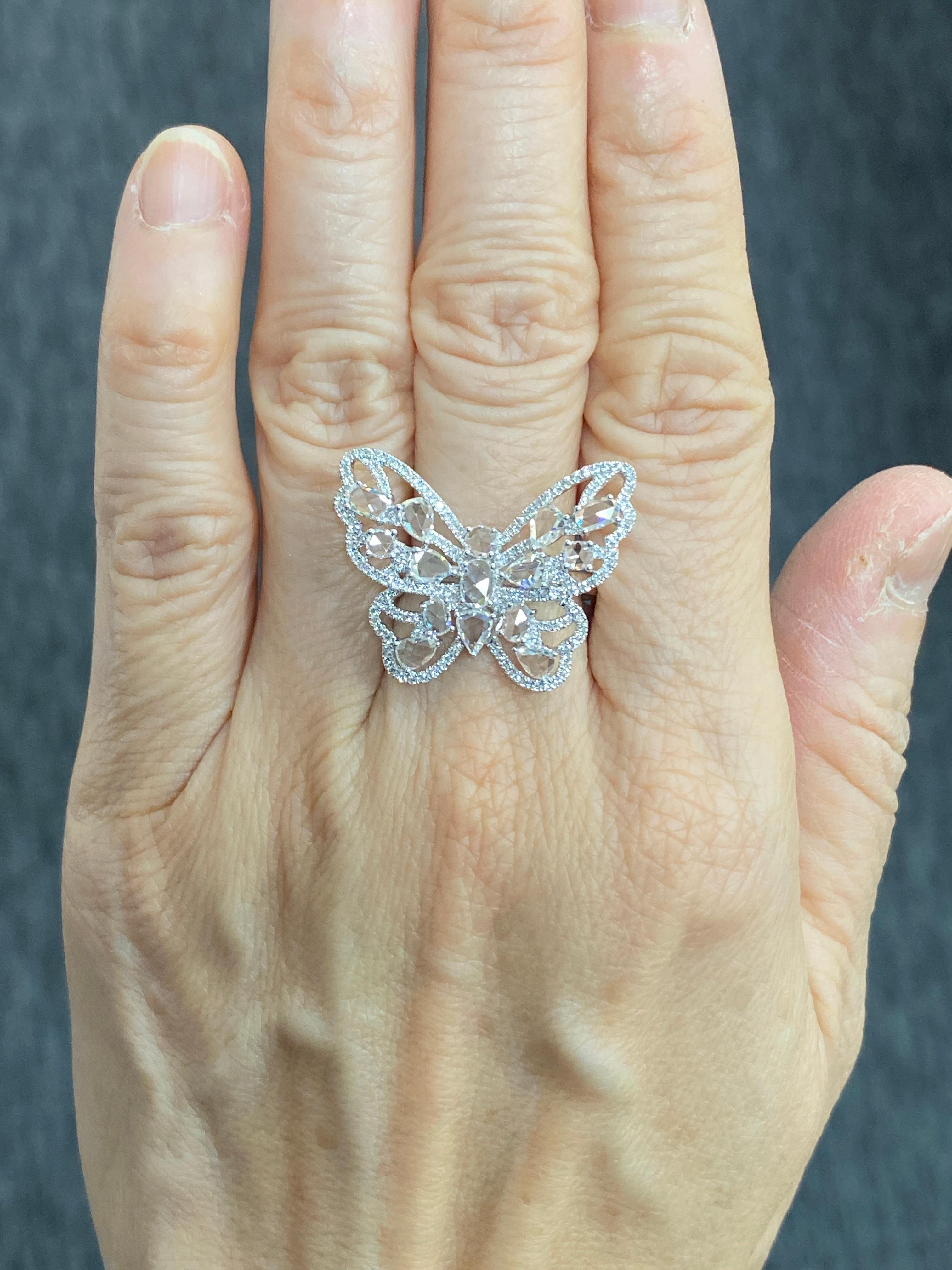 JR Rose Cut Butter Fly 18 Karat White Gold Ring

A delicate Butterfly Ring with Rose-cut diamonds.  The shape of these Rings is unique and beautiful. This luminous beauty will be a great addition of Jewelry collection.

Ring Size : Europe 54 ( US
