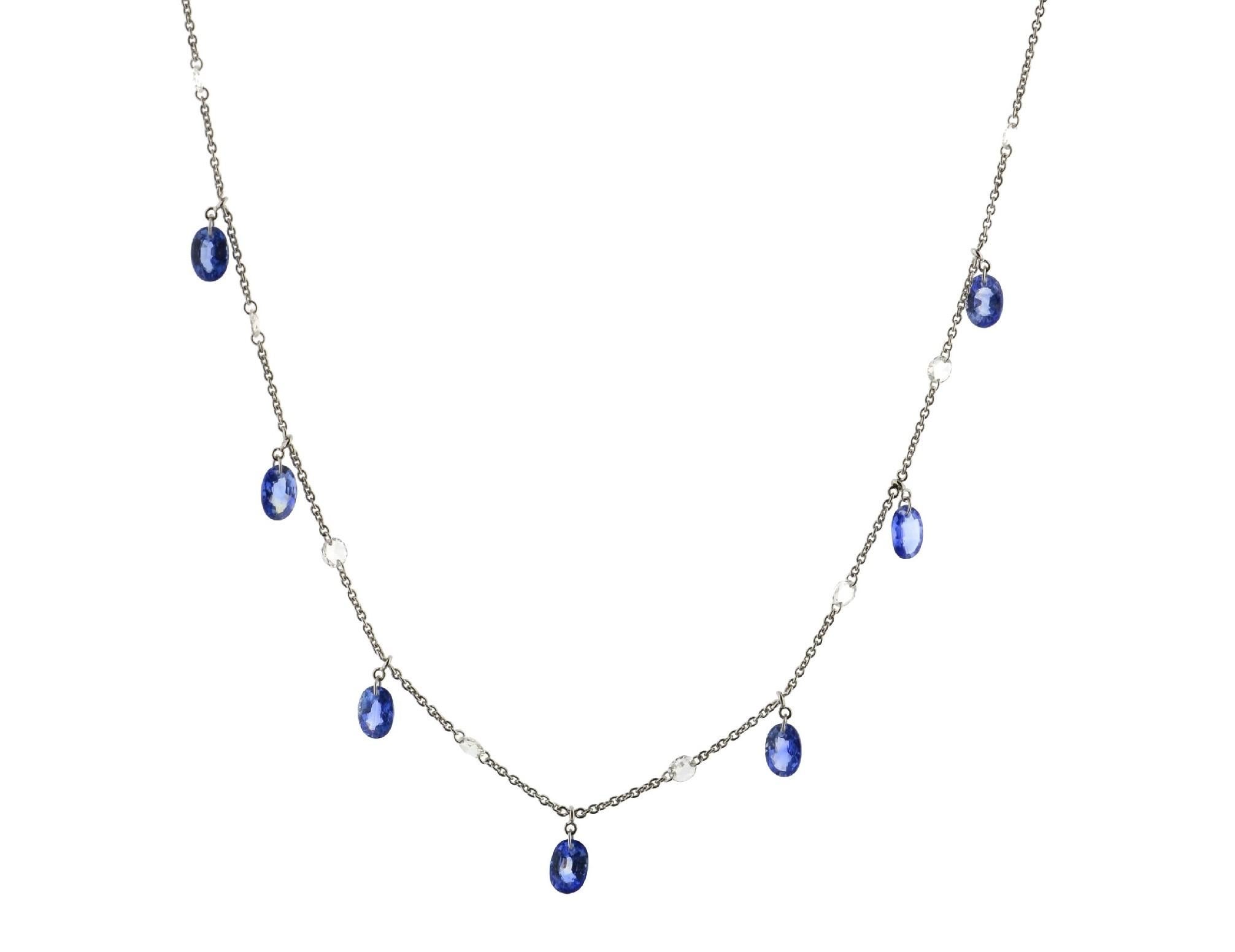 JR Rose Cut Diamond 18 Karat White Gold Sapphire Dangling Choker Necklace

This contemporary piece of necklace is made with rose-cut diamonds(0.50cts) and Sapphire(2.25cts), it eludes femininity & grace. It has slider ball near the clasp to adjust