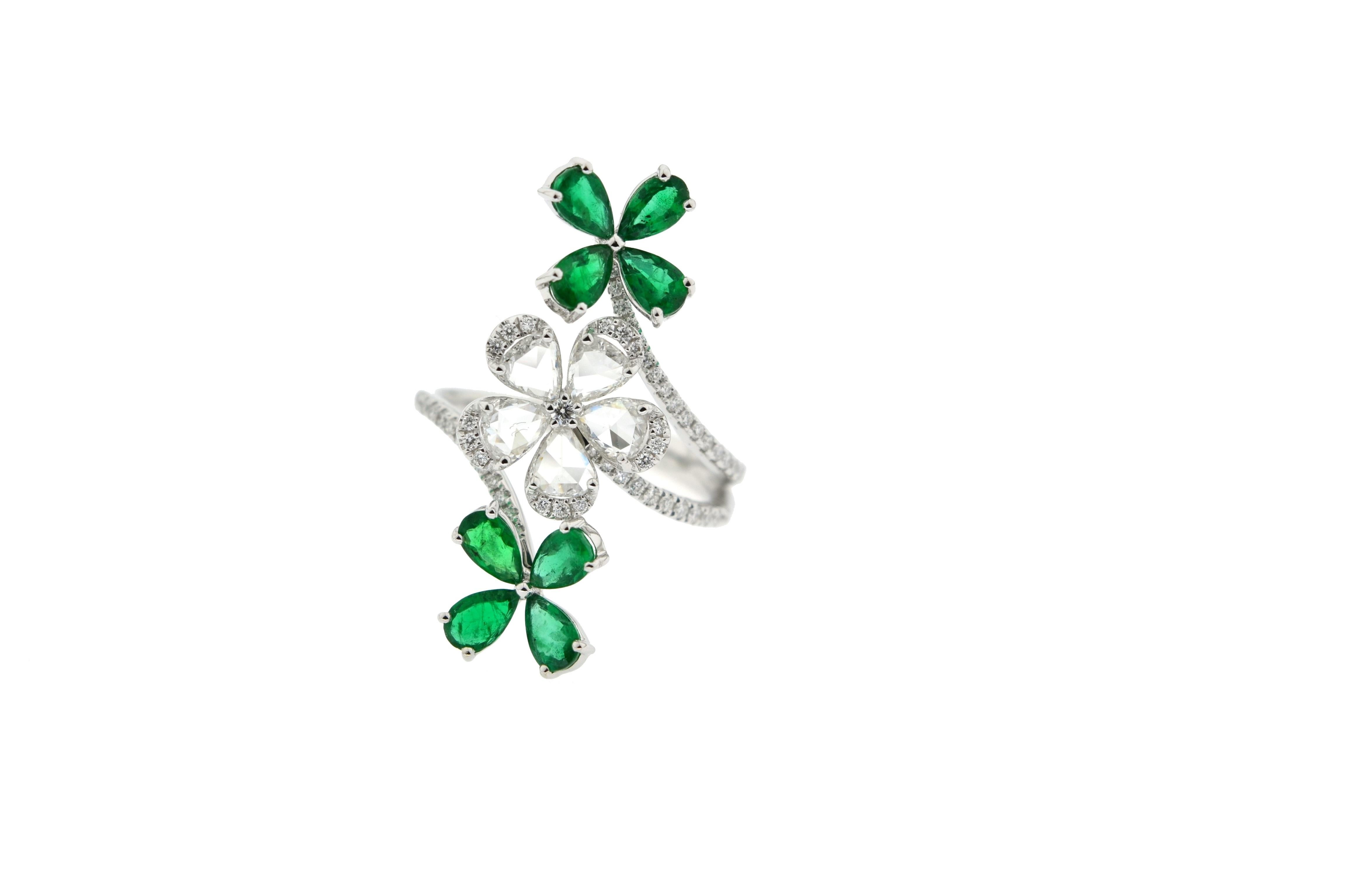 JR Rose Cut Diamond and Emerald Flower Ring 18 Karat White Gold

Our eccentric flower diamond ring is an absolute show-stopper. The rose-cut diamonds & emerald used in it enhances it's look by many folds. It has 1.03 carats White Diamond and 1.42