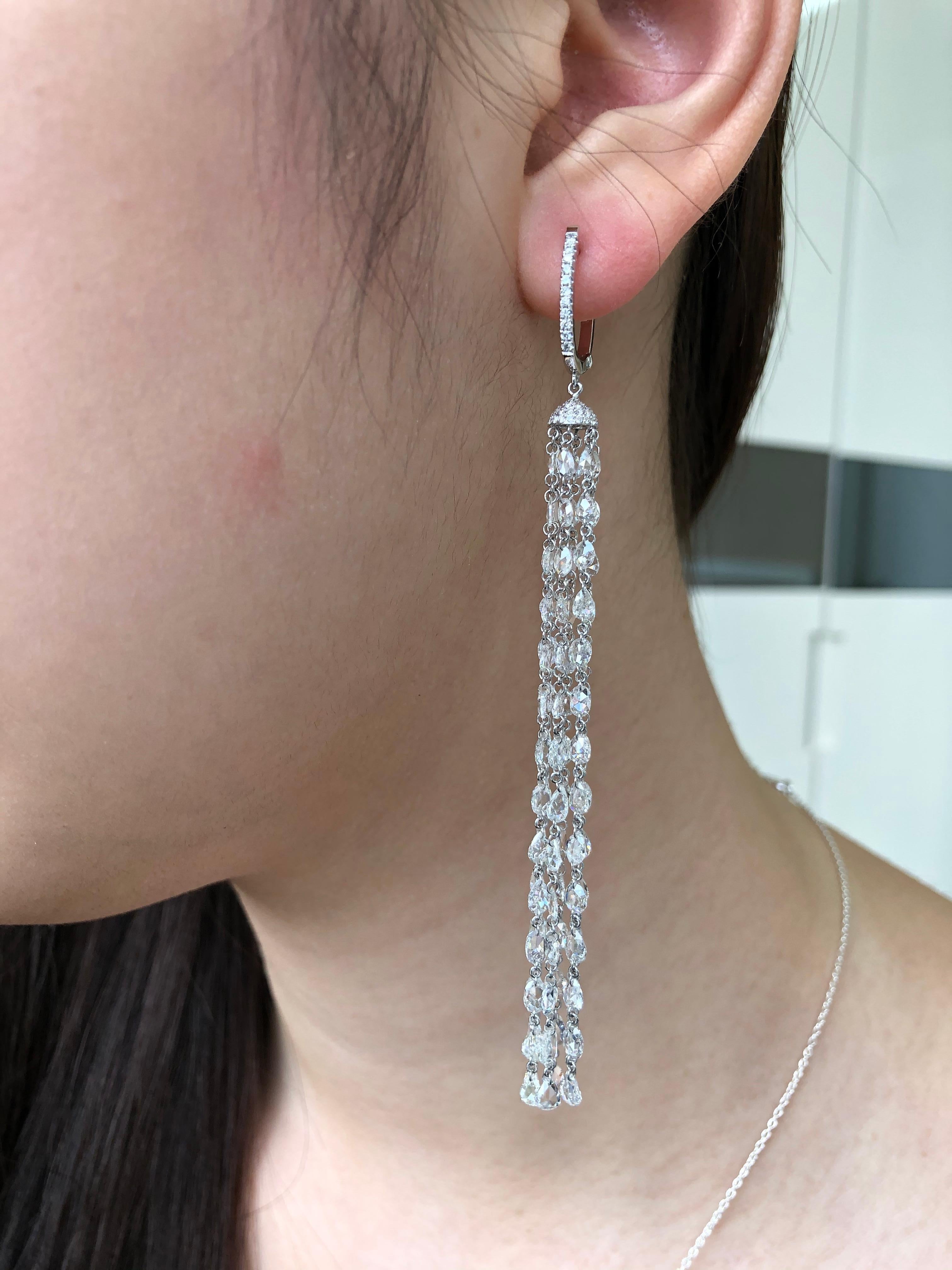 JR Rose Cut Diamond Tassel 18 Karat White Gold Earring

Stylish, graceful and elegant is what this pair of diamond tassel earring is. It moves with sheer grace and is made using excellent craftsmanship. its made using White Rose cut in the tassel &