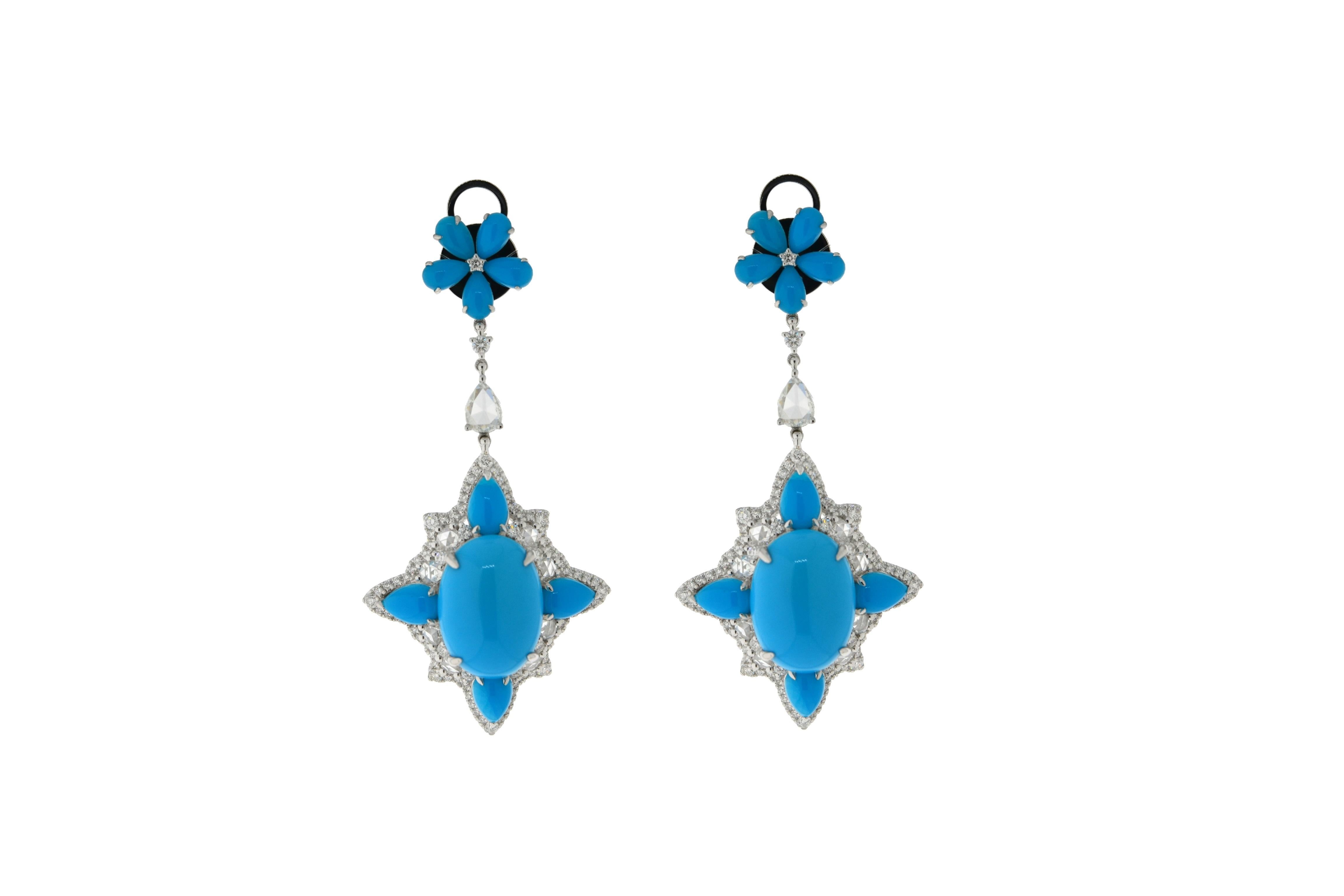 JR, boucles d'oreilles en or blanc 18 carats, turquoise et taille rose

Cette paire de boucles d'oreilles pendantes en diamant taillé en rose et en turquoise est très remarquée. La combinaison de diamants taillés en rose et de la couleur bleue la