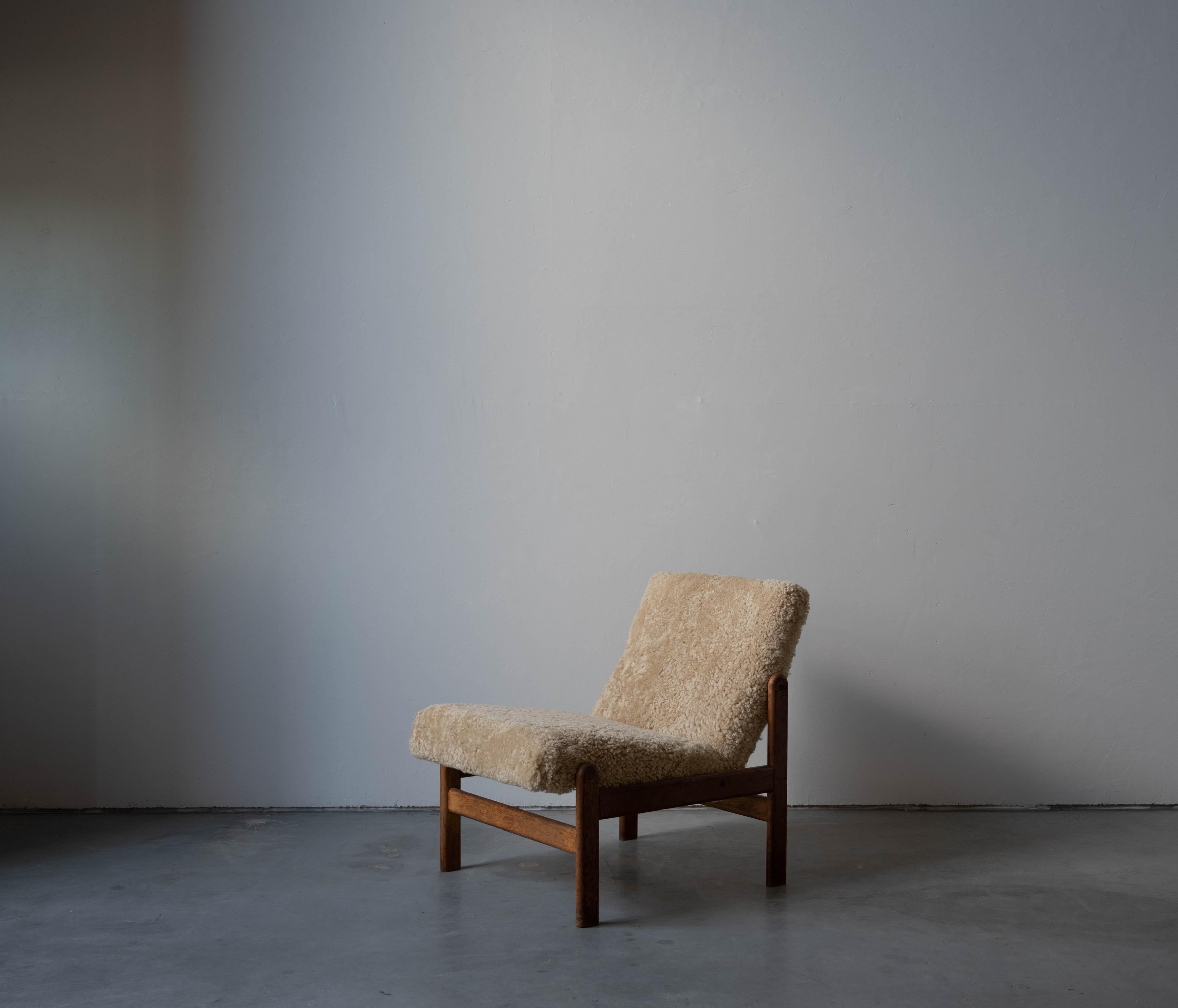 Danish Jørgen Bækmark, Slipper Chair, Oak, Shearling, FDB Møbler, Denmark, 1960s