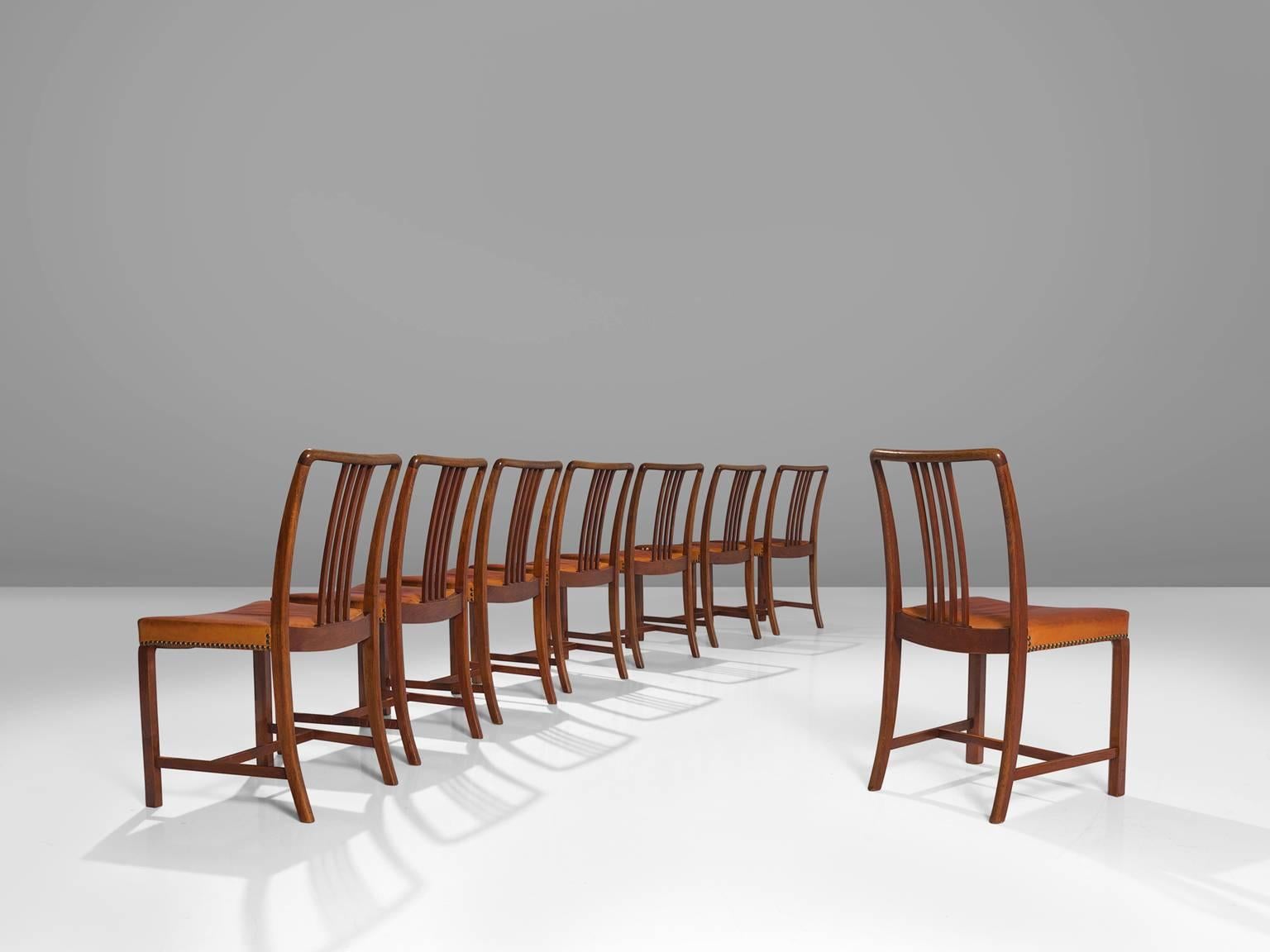 Jørgen Christensen designer and maker, dining chairs, leather, oak, Denmark, 1950s 

This set of modest Danish dining chairs is part of the midcentury design collection. The seats are upholstered with patinated natural leather and finished with