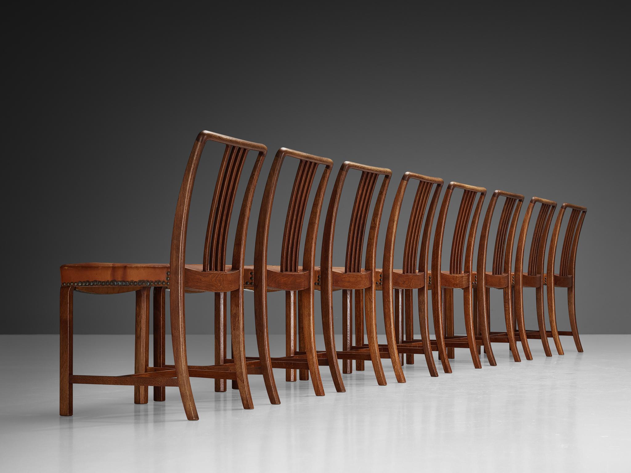 Scandinavian Modern Jørgen Christensens Set of Eight Dining Chairs in Cognac Leather and Oak For Sale