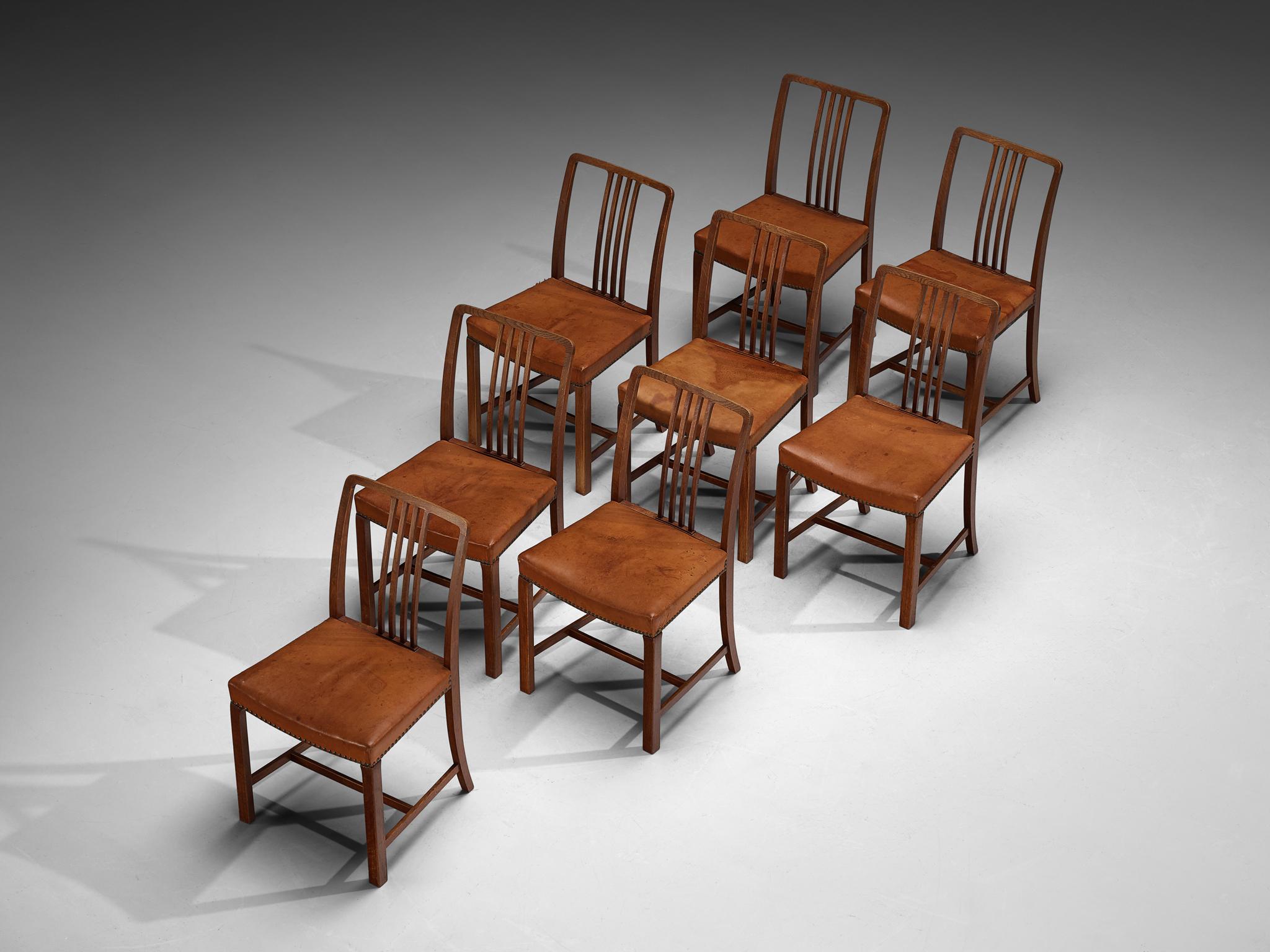 Danish Jørgen Christensens Set of Eight Dining Chairs in Cognac Leather and Oak For Sale