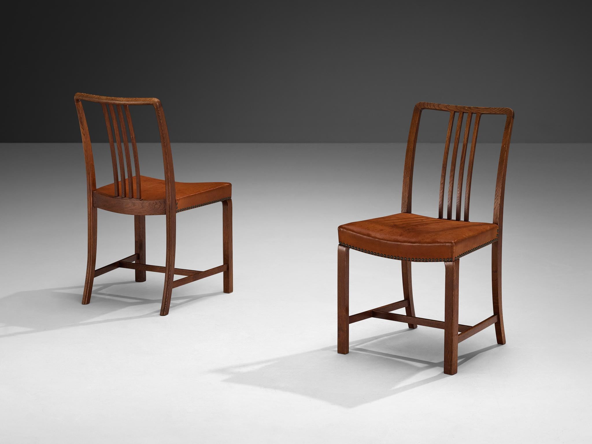 Mid-20th Century Jørgen Christensens Set of Eight Dining Chairs in Cognac Leather and Oak For Sale