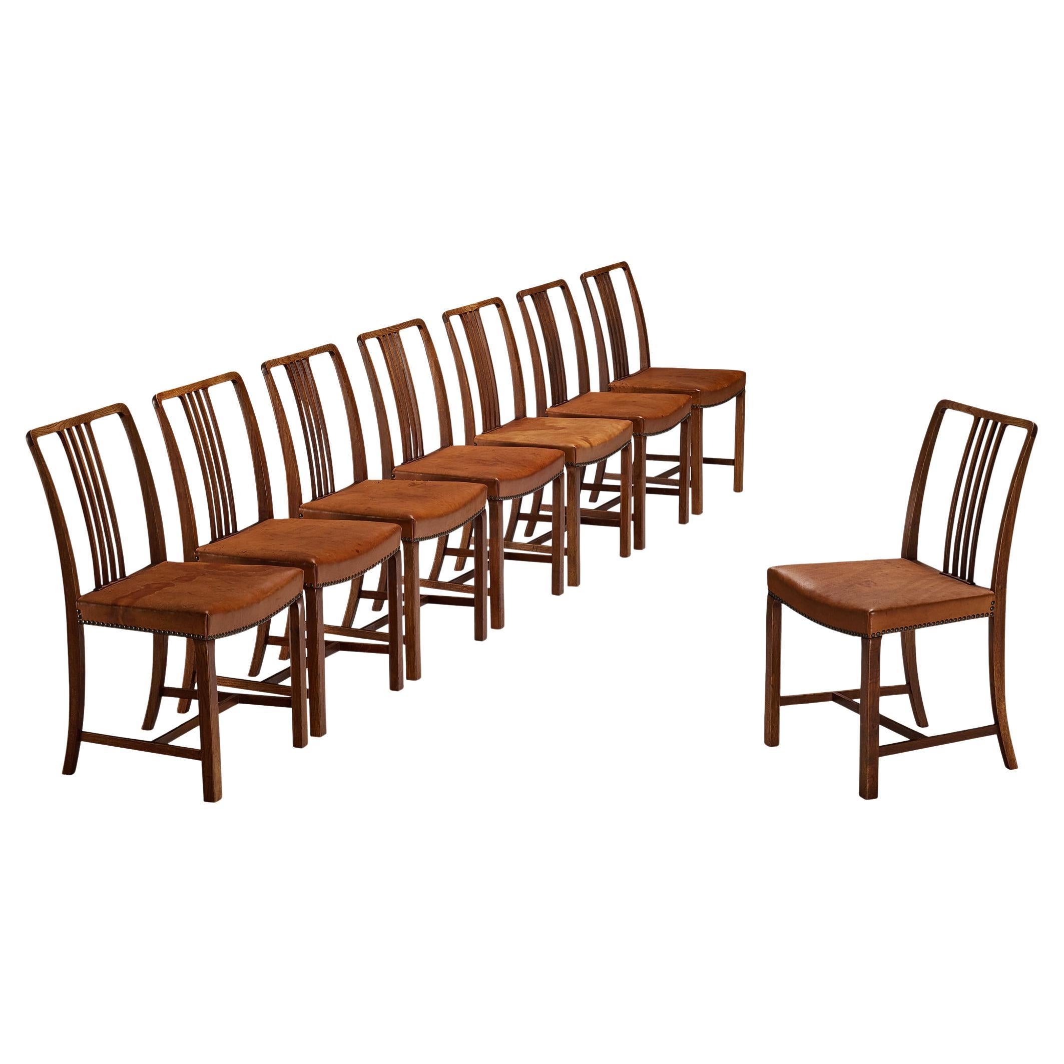 Jørgen Christensens Set of Eight Dining Chairs in Cognac Leather and Oak