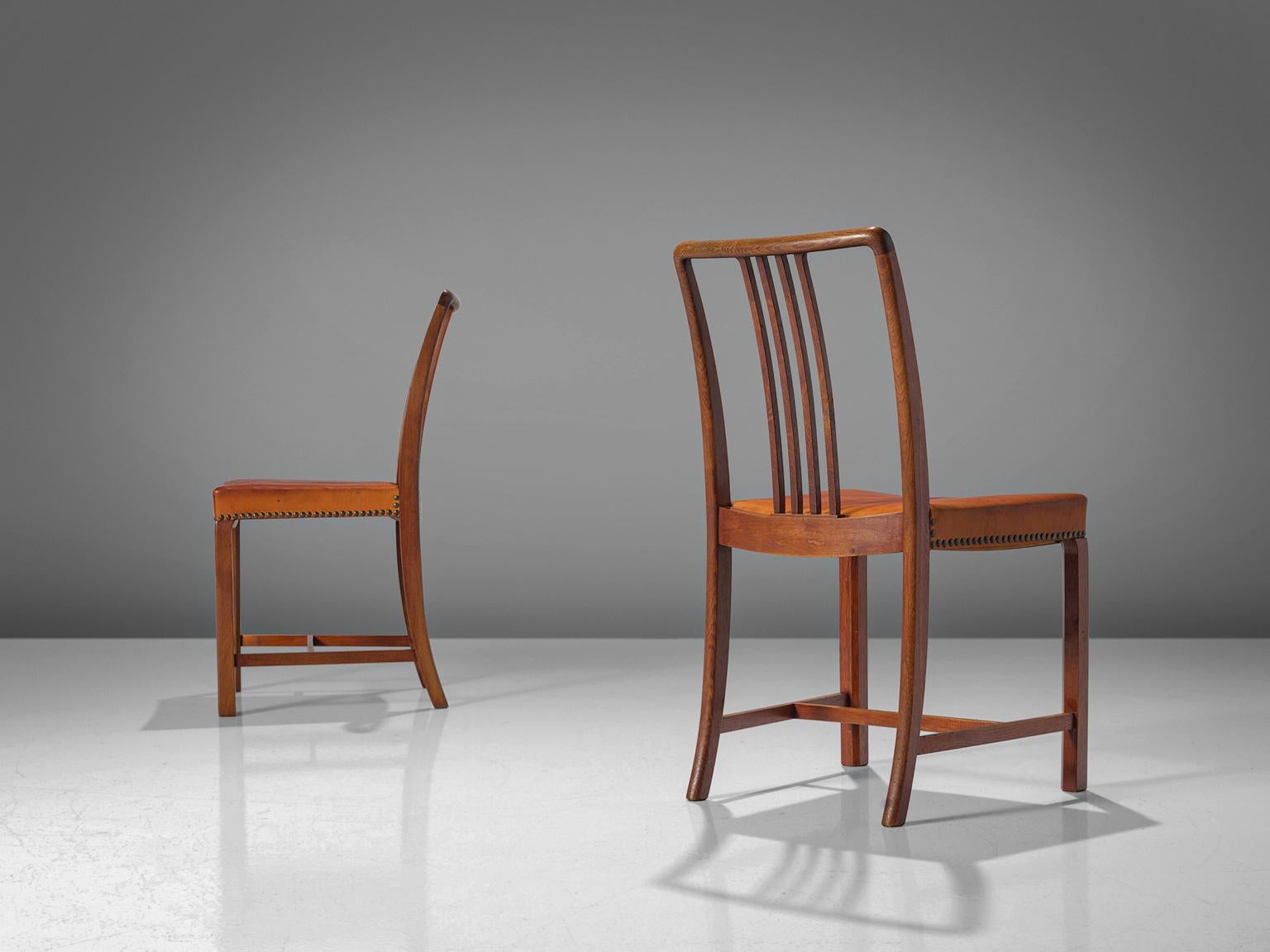 Danish Jørgen Christensens Set of Eight Dining Chairs in Cognac Leather and Oak  For Sale