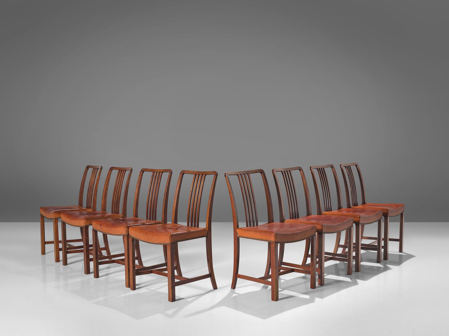 Milieu du XXe siècle Jørgen Christensens Ensemble de huit chaises de salle à manger en cuir cognac et Oak  en vente