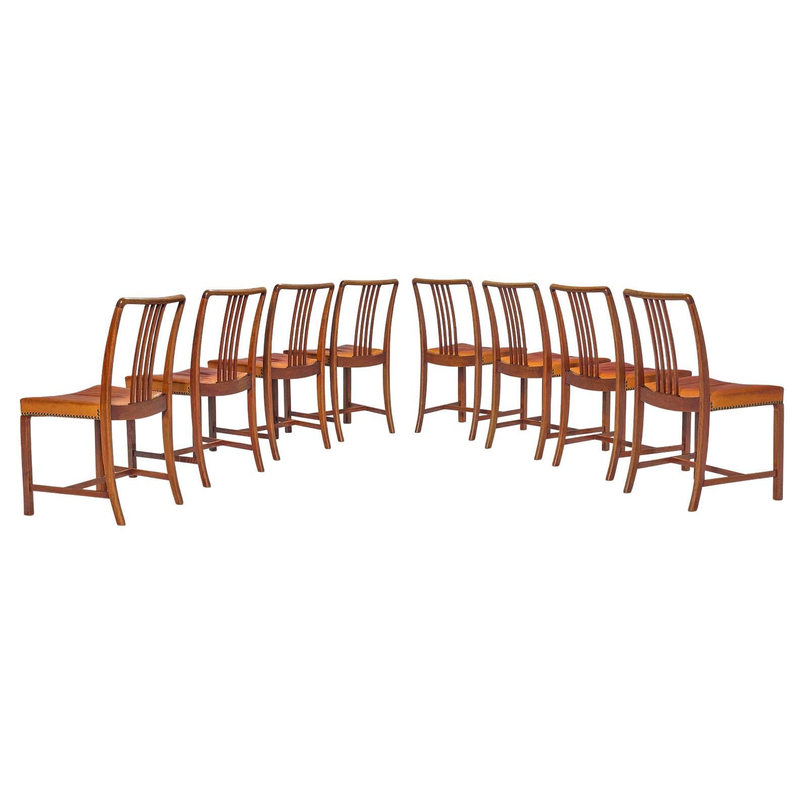 Jørgen Christensens Set of Eight Dining Chairs in Cognac Leather and Oak  For Sale